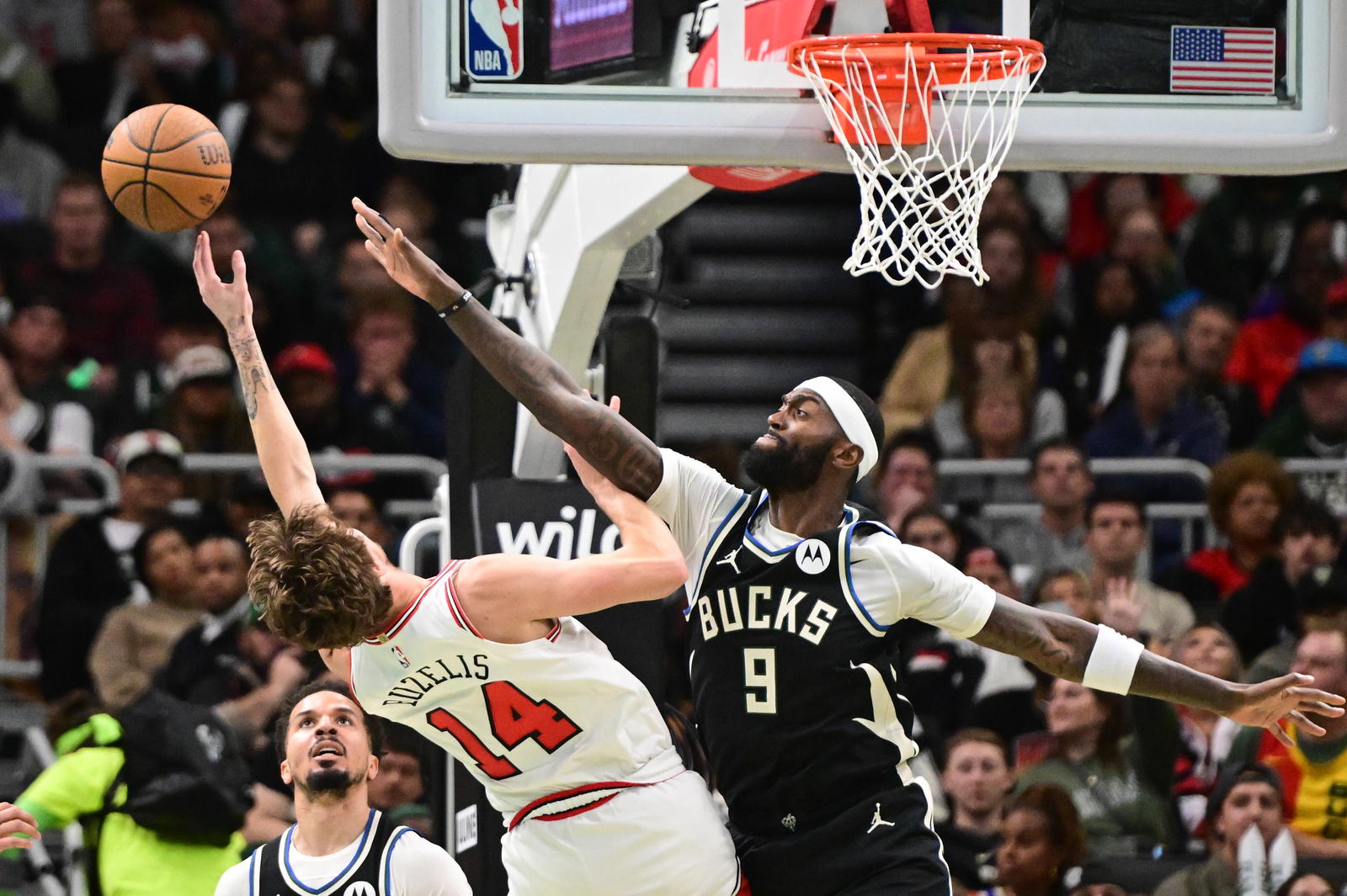 Milwaukee Bucks forward Bobby Portis (9) blocks a shot by Chicago Bulls forward Matas Buzelis (14) in the 3rd quarter at Fiserv Forum.&nbsp;Benny Sieu-Imagn Images