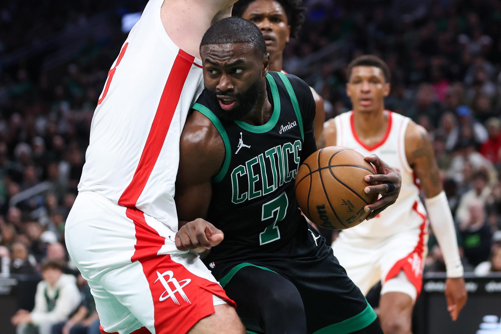 Nov 1, 2025; Boston, Massachusetts, USA; Boston Celtics forward Jaylen Brown (7) drives to the basket during the first half against the Houston Rockets at TD Garden. (Paul Rutherford/Imagn Images)