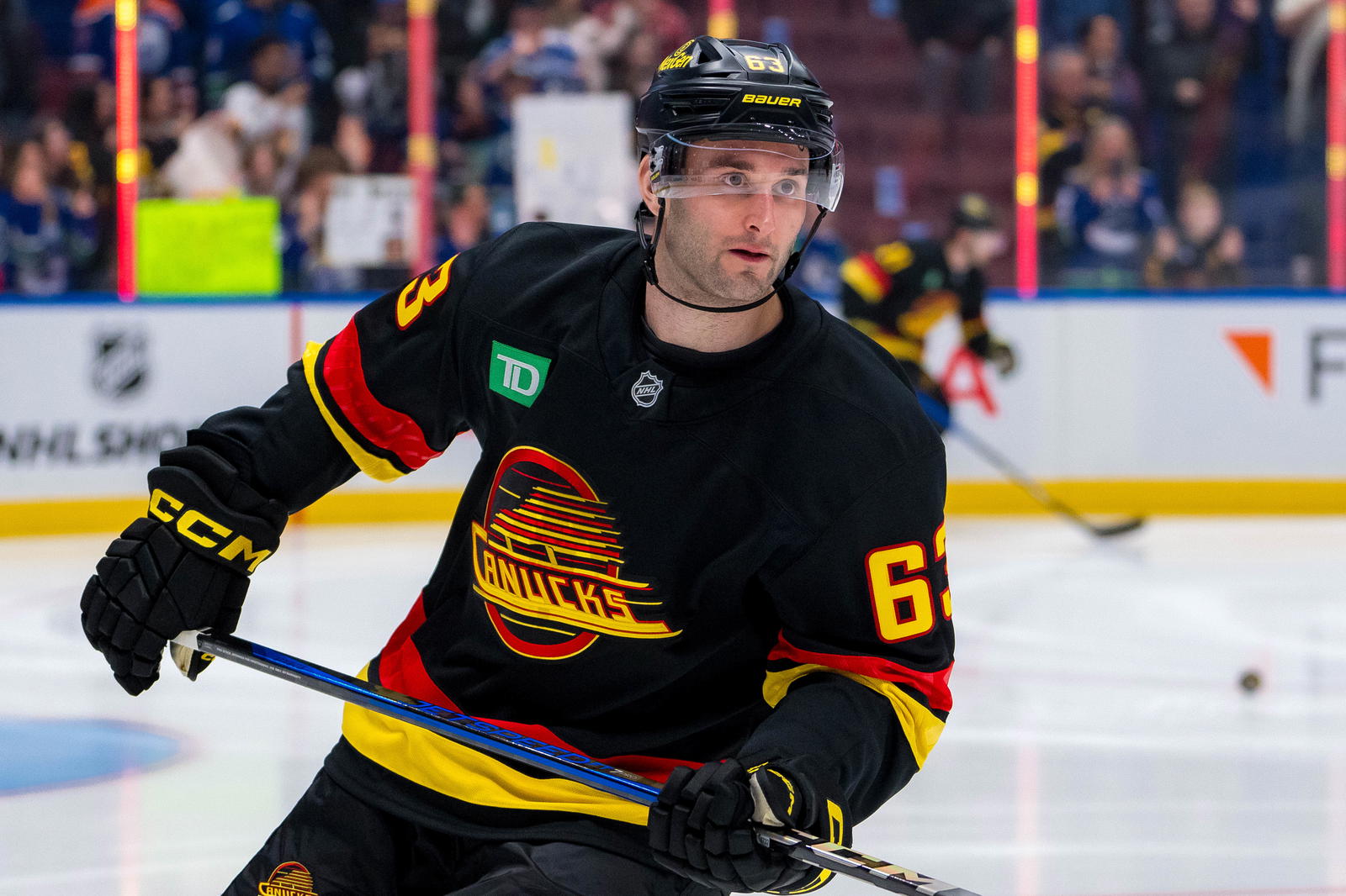 Jan 18, 2025; Vancouver, British Columbia, CAN; Vancouver Canucks forward Max Sasson (63) skates during warm up prior to a game against the Edmonton Oilers at Rogers Arena. Mandatory Credit: Bob Frid-Imagn Images