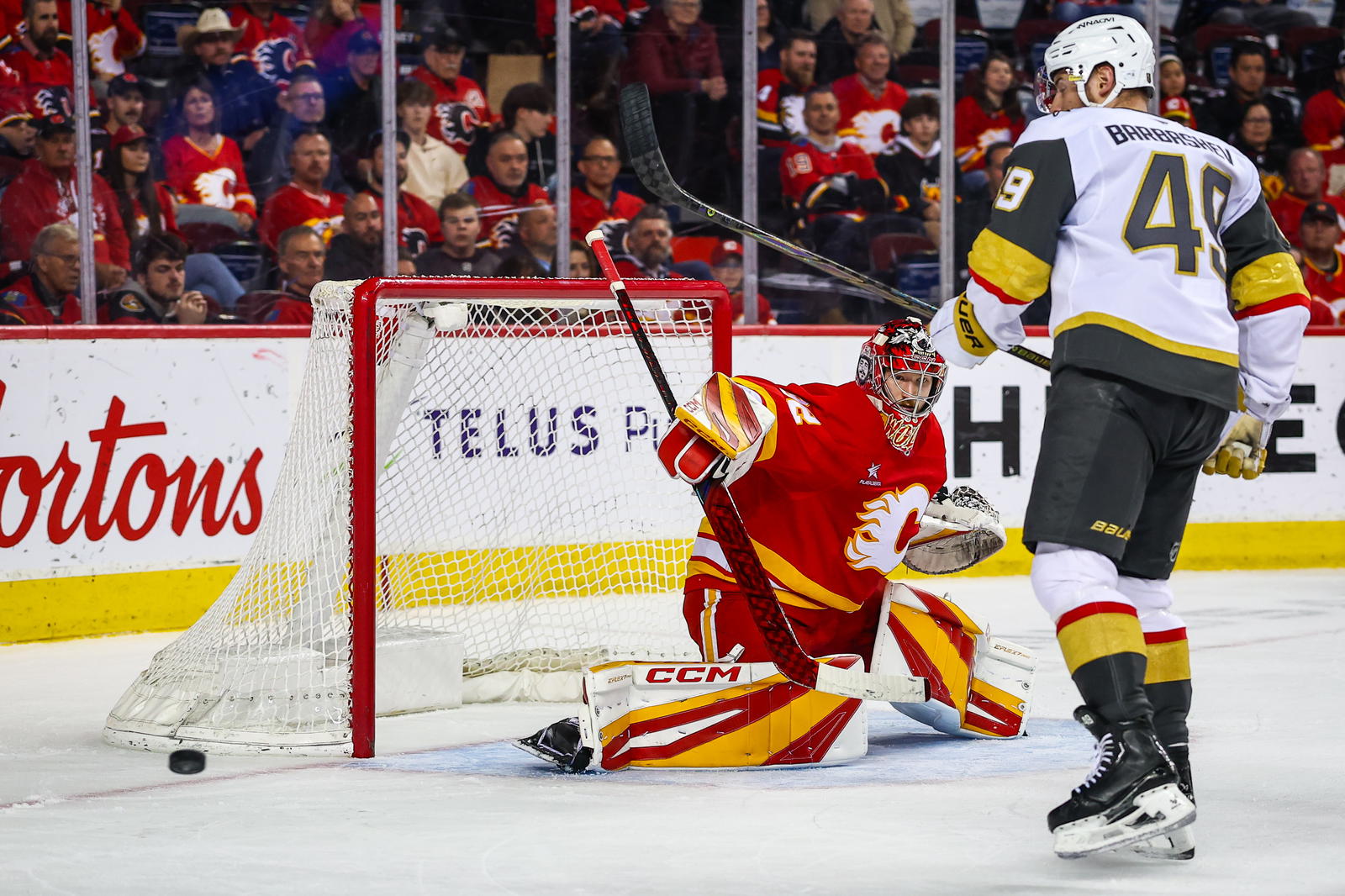 Calgary Flames goaltender Dustin Wolf (32) guards his net against the Vegas Golden Knights during the third period at the Scotiabank Saddledome on Thursday, April 15, 2025 in Calgary. (Photo: Sergei Belski-Imagn Images)