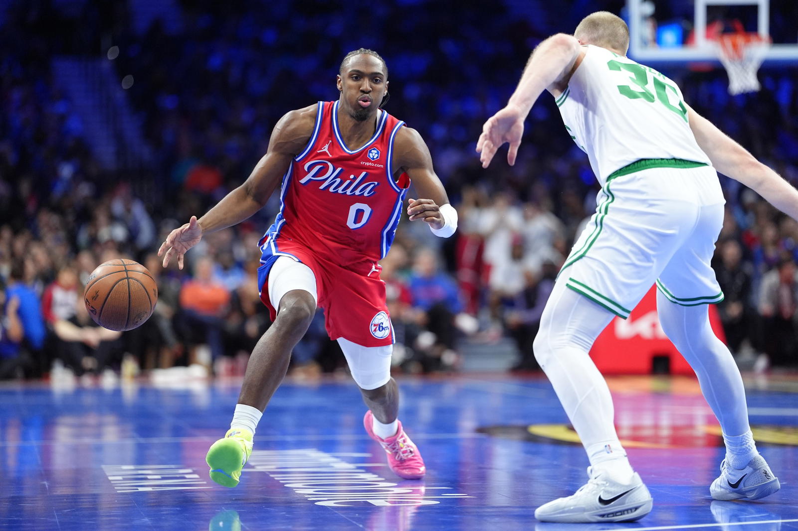 Oct 31, 2025; Philadelphia, Pennsylvania, USA; Philadelphia 76ers guard Tyrese Maxey (0) loses control of the ball against Boston Celtics forward Sam Hauser (30) in the fourth quarter at Xfinity Mobile Arena. (Kyle Ross/Imagn Images)