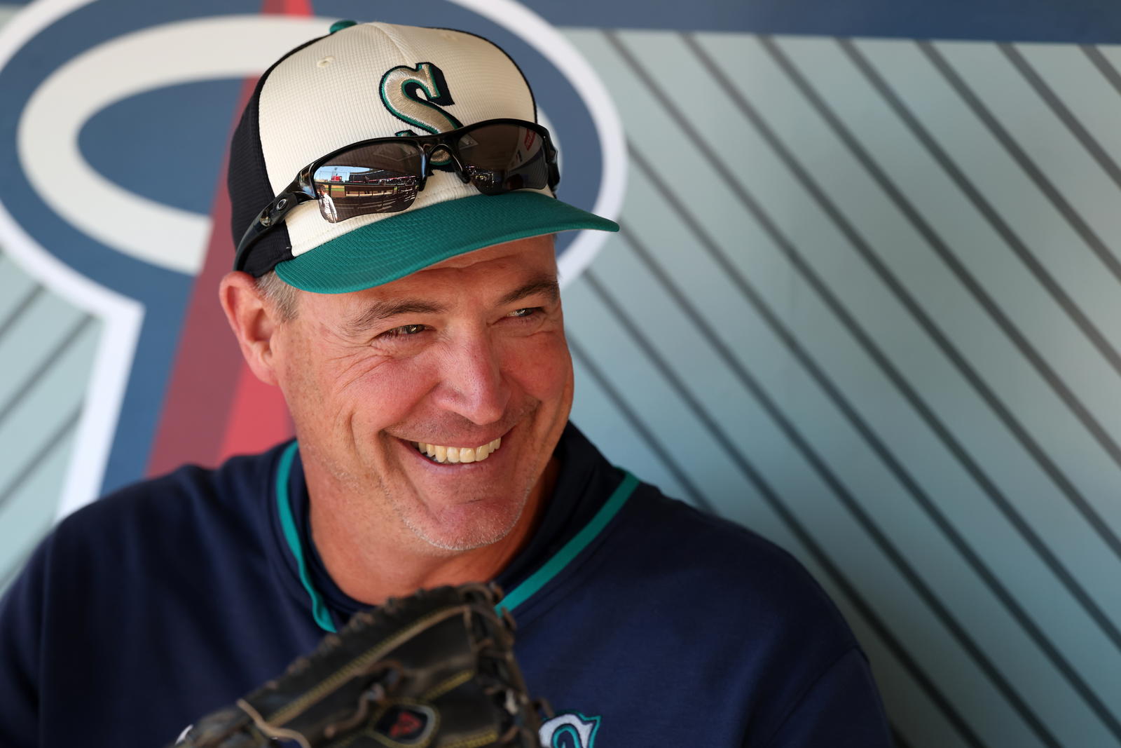 Seattle Mariners manager Dan Wilson (6) smiles in the dugout before the game against the Los Angeles Angels at Angel Stadium. Kiyoshi Mio-Imagn Images