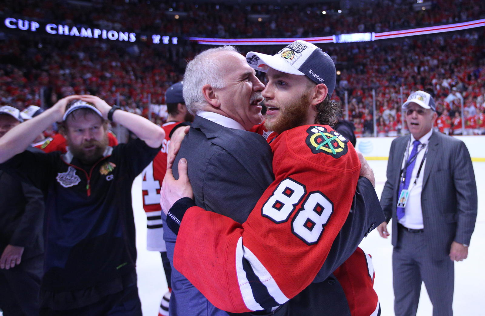 Jun 15, 2015; Chicago, IL, USA; Chicago Blackhawks right wing Patrick Kane (88) hugs head coach Joel Quenneville (left) after defeating the Tampa Bay Lightning in game six of the 2015 Stanley Cup Final at United Center. Mandatory Credit: Dennis Wierzbicki-Imagn Images
