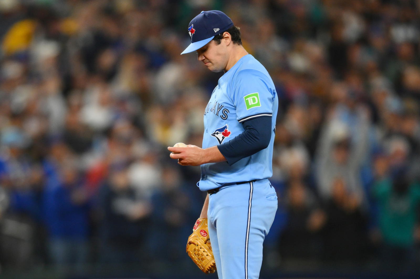 Oct 17, 2025; Seattle, Washington, USA; Toronto Blue Jays catcher Tyler Heineman (55) reacts before being taken out of the game against the Seattle Mariners during the eighth inning during game five of the ALCS round for the 2025 MLB playoffs at T-Mobile Park. (Steven Bisig/Imagn Images)