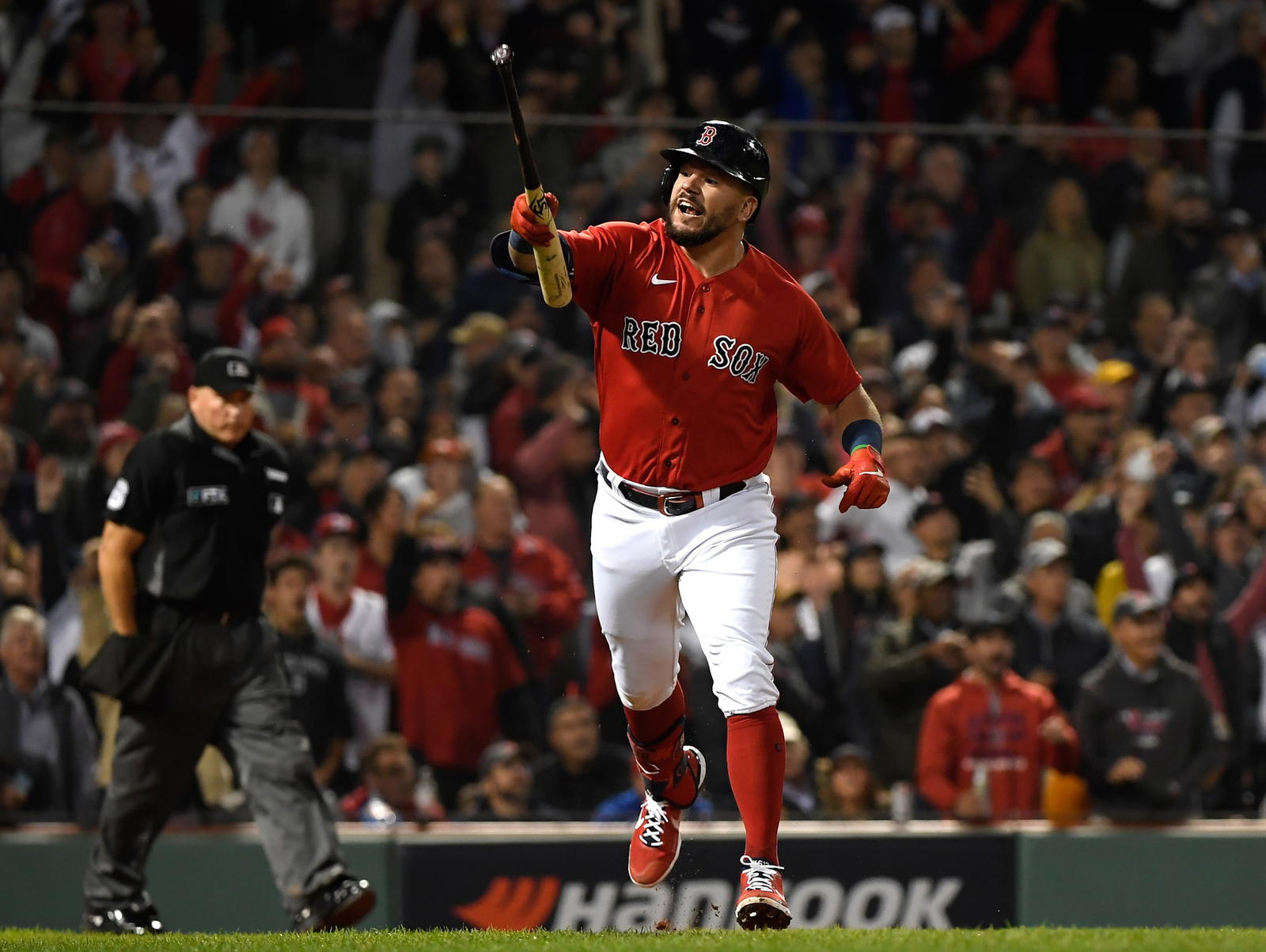 Oct 5, 2021; Boston, Massachusetts, USA; Boston Red Sox designated hitter Kyle Schwarber (18) reacts after hitting a home run during the third inning in a wild card game against the New York Yankees at Fenway Park. (Bob DeChiara/Imagn Images)