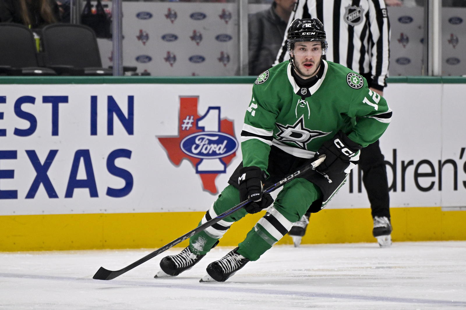 Jan 2, 2025; Dallas, Texas, USA; Dallas Stars right wing Arttu Hyry (12) skates against the Ottawa Senators during the second period at the American Airlines Center. Credit: Jerome Miron-Imagn Images
