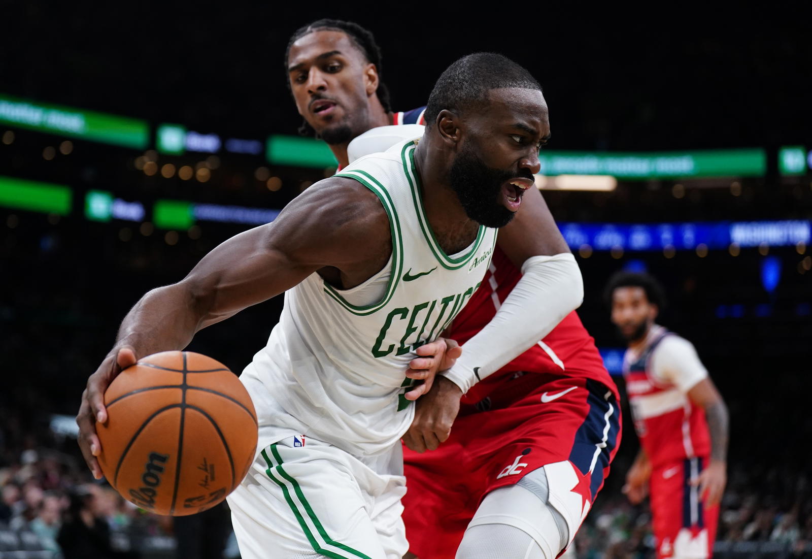 Nov 5, 2025; Boston, Massachusetts, USA; Boston Celtics guard/forward Jaylen Brown (7) drives the ball against Washington Wizards center Alex Sarr (20) in the second half at TD Garden. (David Butler II/Imagn Images)