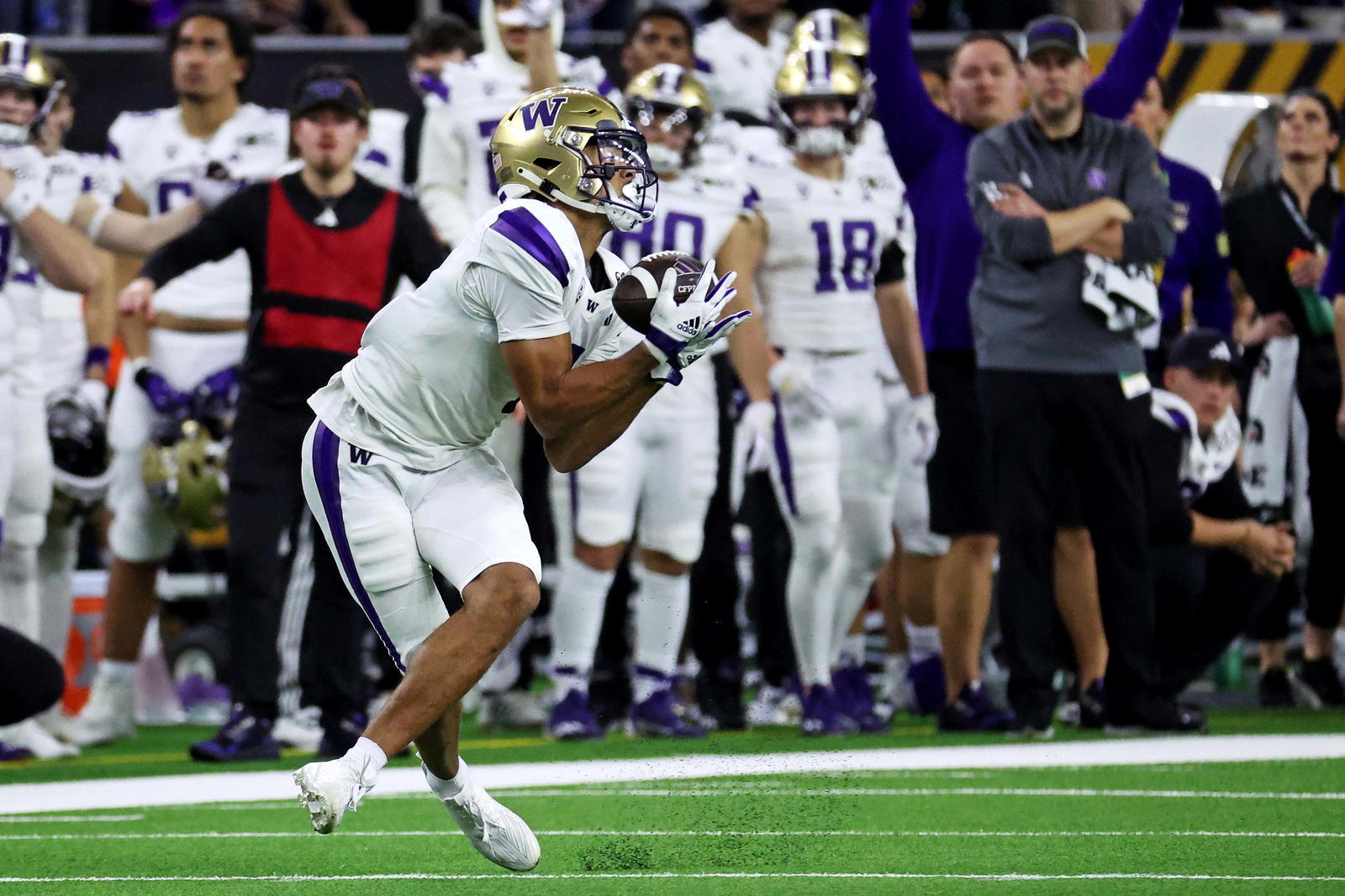 Washington Huskies wide receiver Rome Odunze (1) makes a catch during the fourth quarter against the Michigan Wolverines in the 2024 College Football Playoff national championship game at NRG Stadium. Troy Taormina-Imagn Images