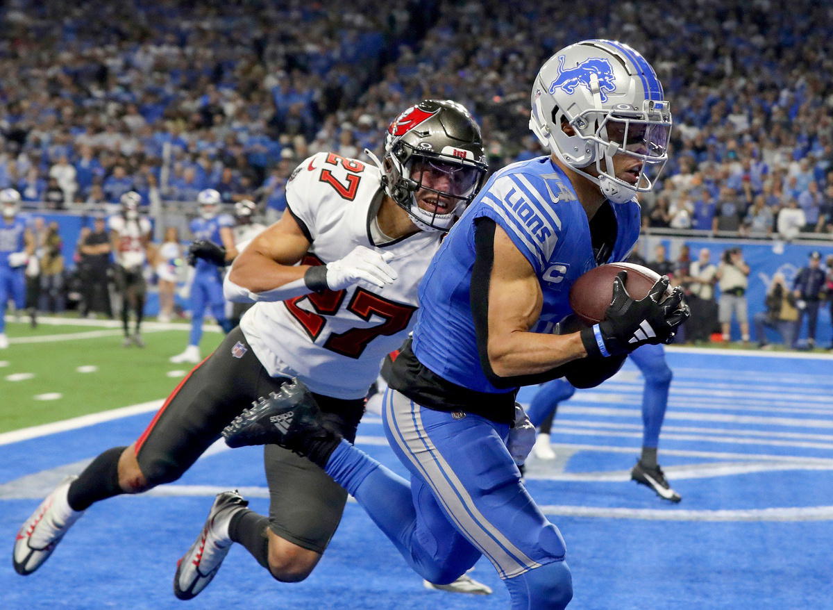 St. Brown scoring last year against Bucs in Detroit. @ Eric Seals