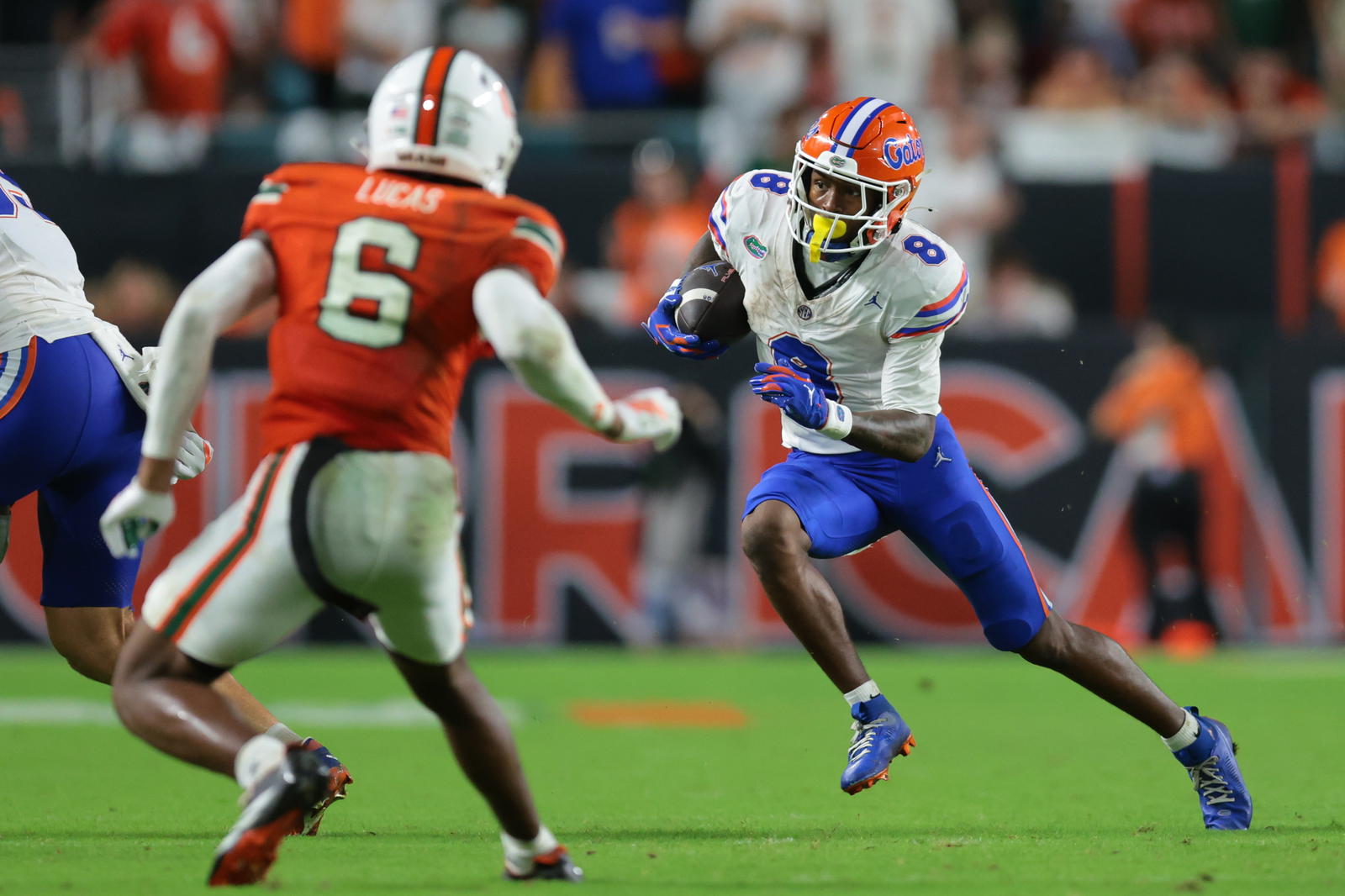 Florida Gators wide receiver Vernell Brown III (8) carries the football against the Miami Hurricanes during the third quarter at Hard Rock Stadium. <br>Sam Navarro-Imagn Images