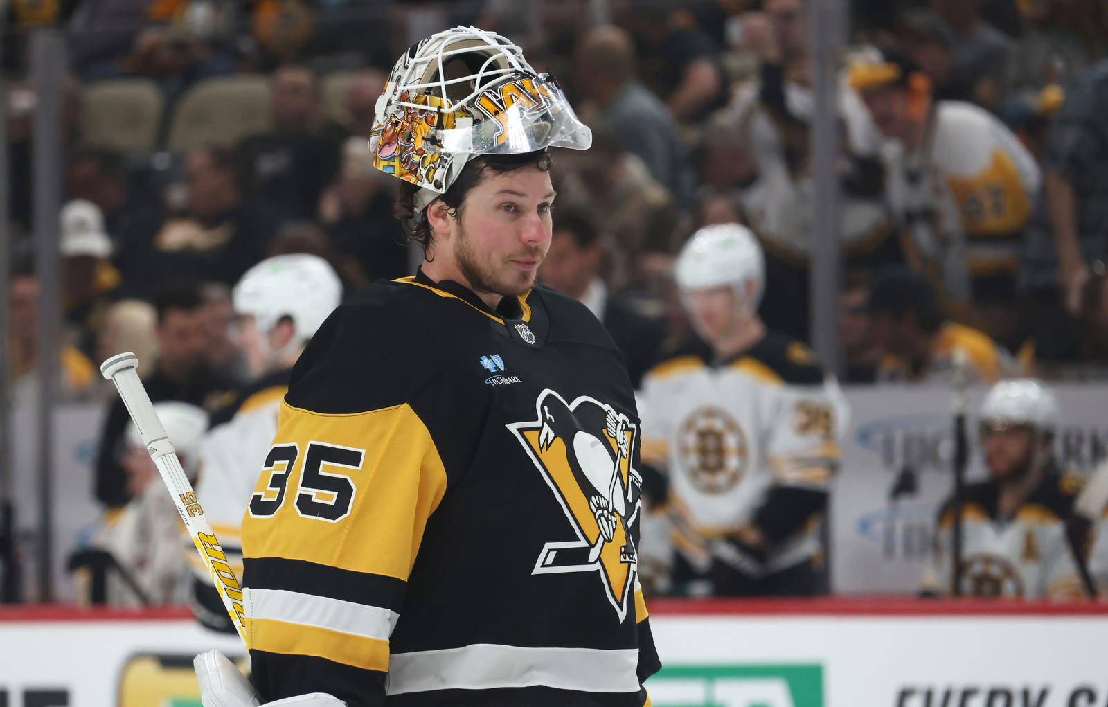 Apr 13, 2025; Pittsburgh, Pennsylvania, USA; Pittsburgh Penguins goaltender Tristan Jarry (35) returns to his net against the Boston Bruins during the second period at PPG Paints Arena. Mandatory Credit: Charles LeClaire-Imagn Images