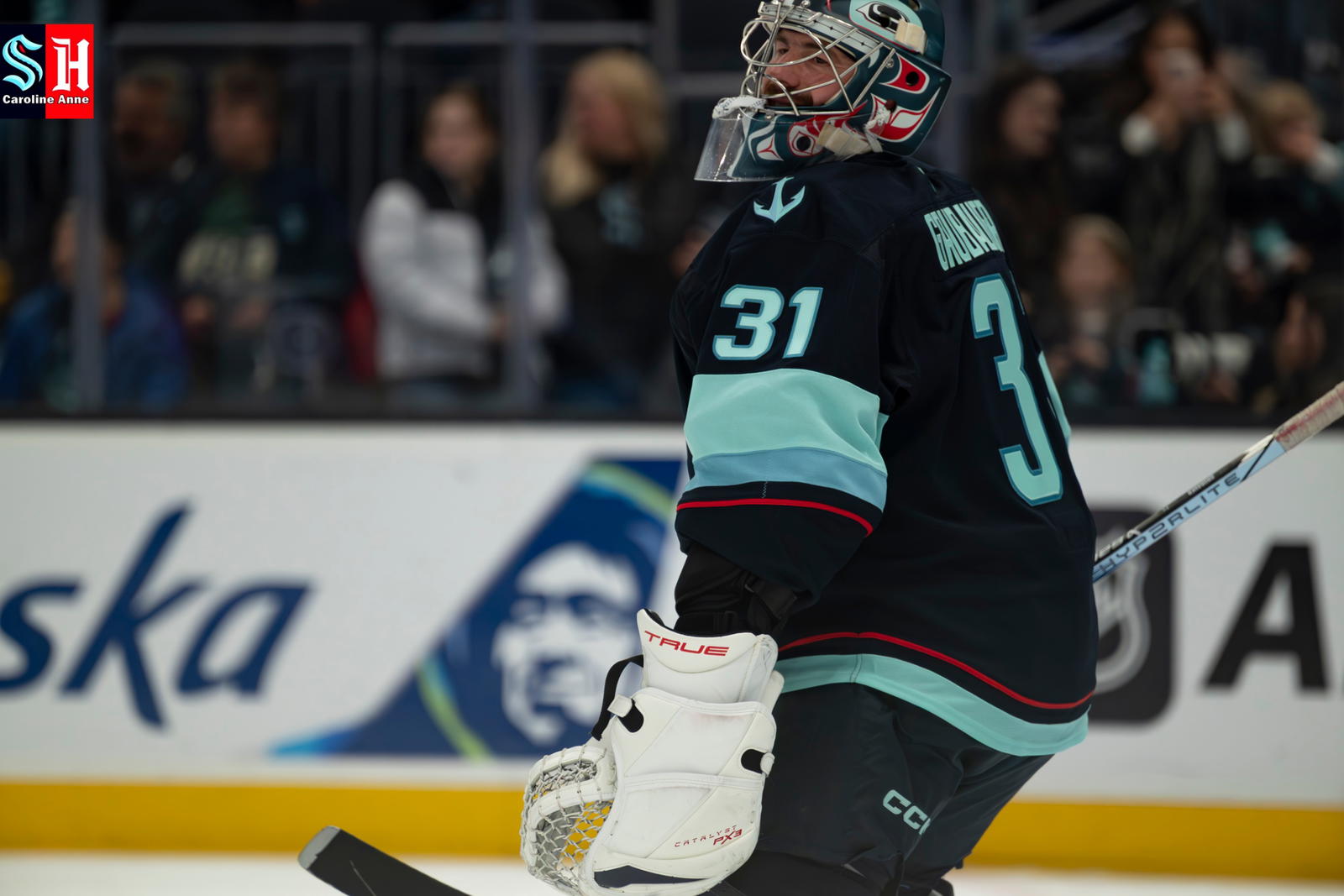Philipp Grubauer smiles to the crowd of fans at Climate Pledge Arena on March 4, 2025. Photo by Caroline Anne
