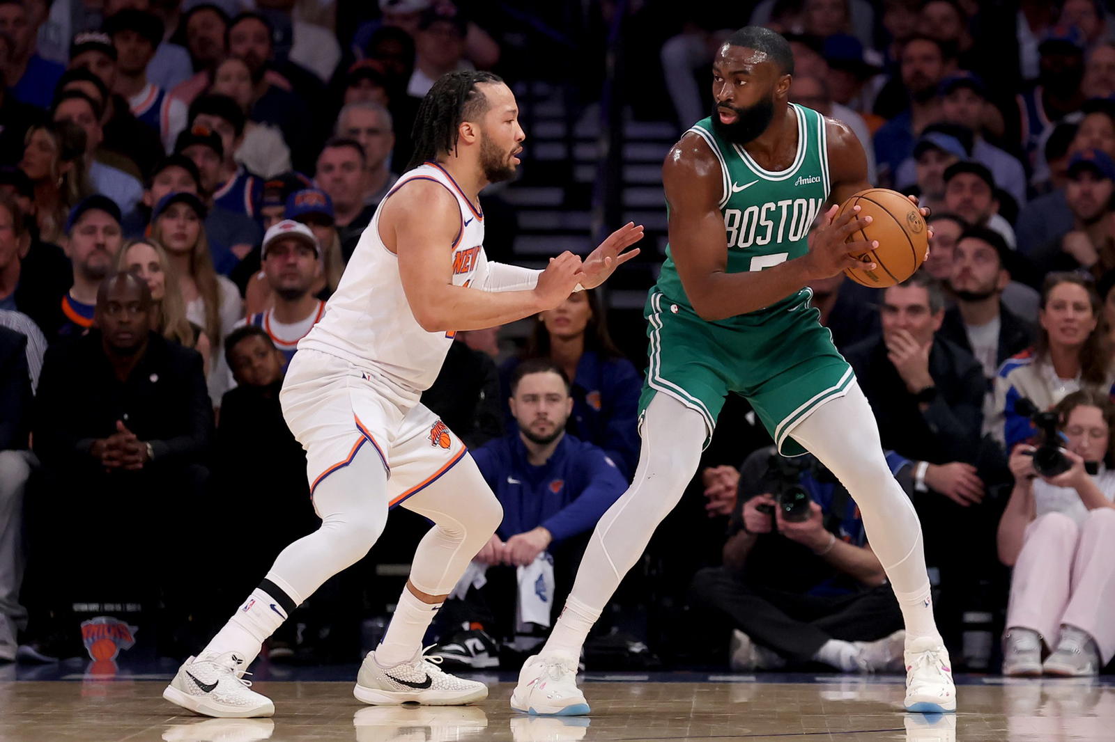 May 16, 2025; New York, New York, USA; Boston Celtics guard Jaylen Brown (7) controls the ball against New York Knicks guard Jalen Brunson (11) during the first quarter of game six in the second round of the 2025 NBA Playoffs at Madison Square Garden. (Brad Penner/Imagn Images)