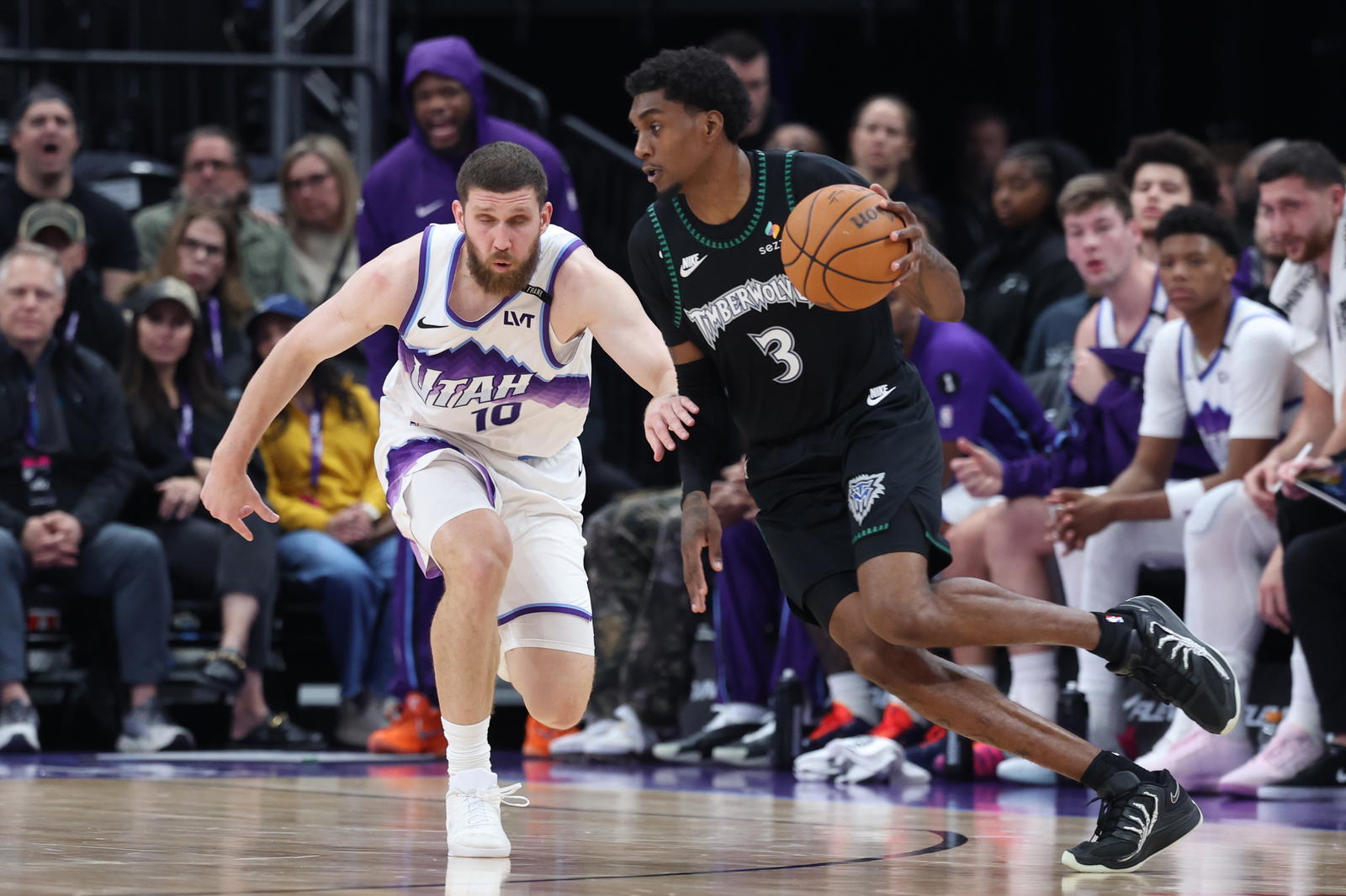 Minnesota Timberwolves forward Jaden McDaniels (3) dribbles against Utah Jazz guard Svi Mykhailiuk (10) during the second quarter at Delta Center.&nbsp;Rob Gray-Imagn Images
