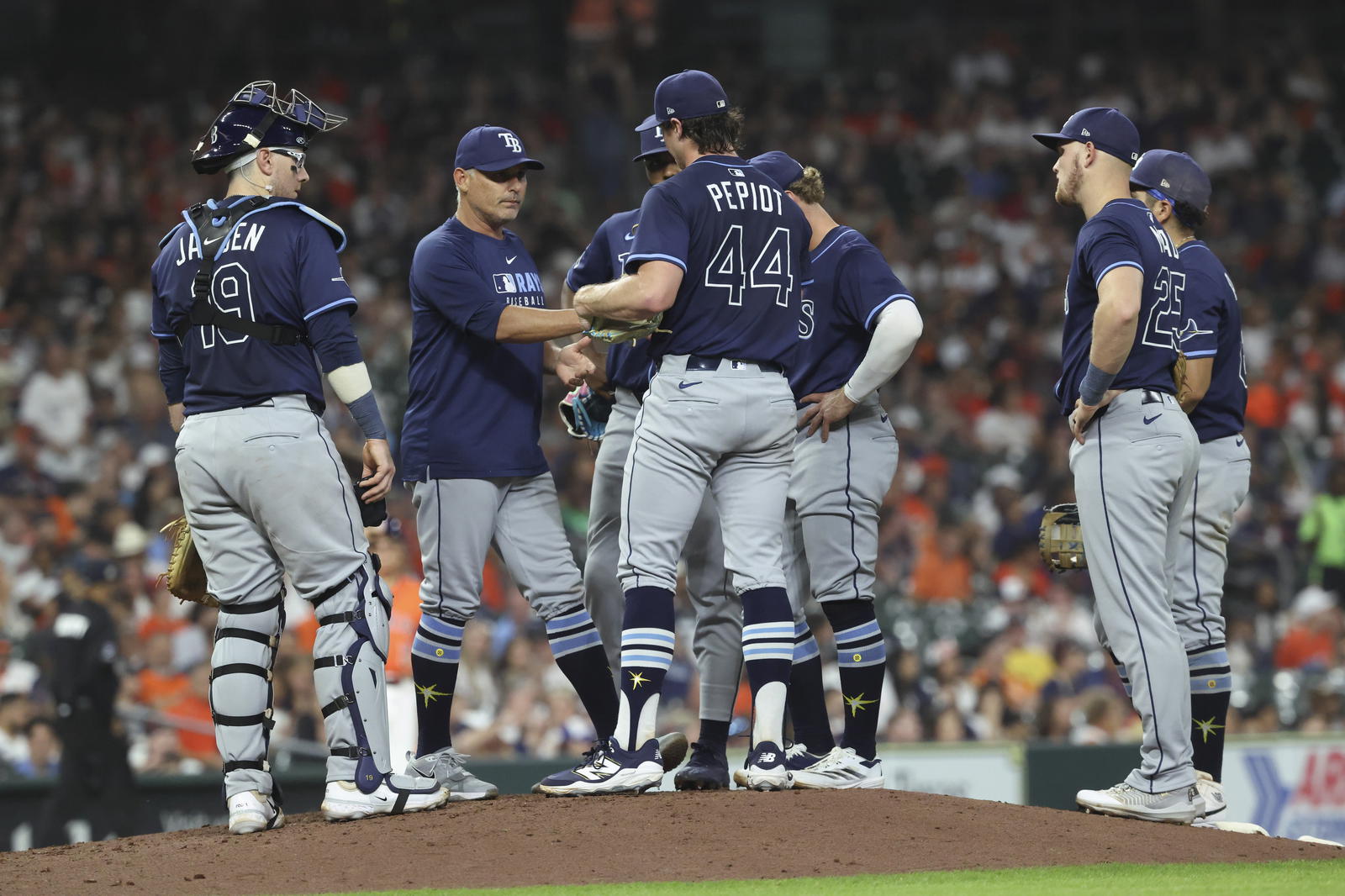 Tampa Bay Rays manager Kevin Cash takes the ball from Ryan Pepiot (44) during a game in Houston in May.  Troy Taormina-Imagn Images