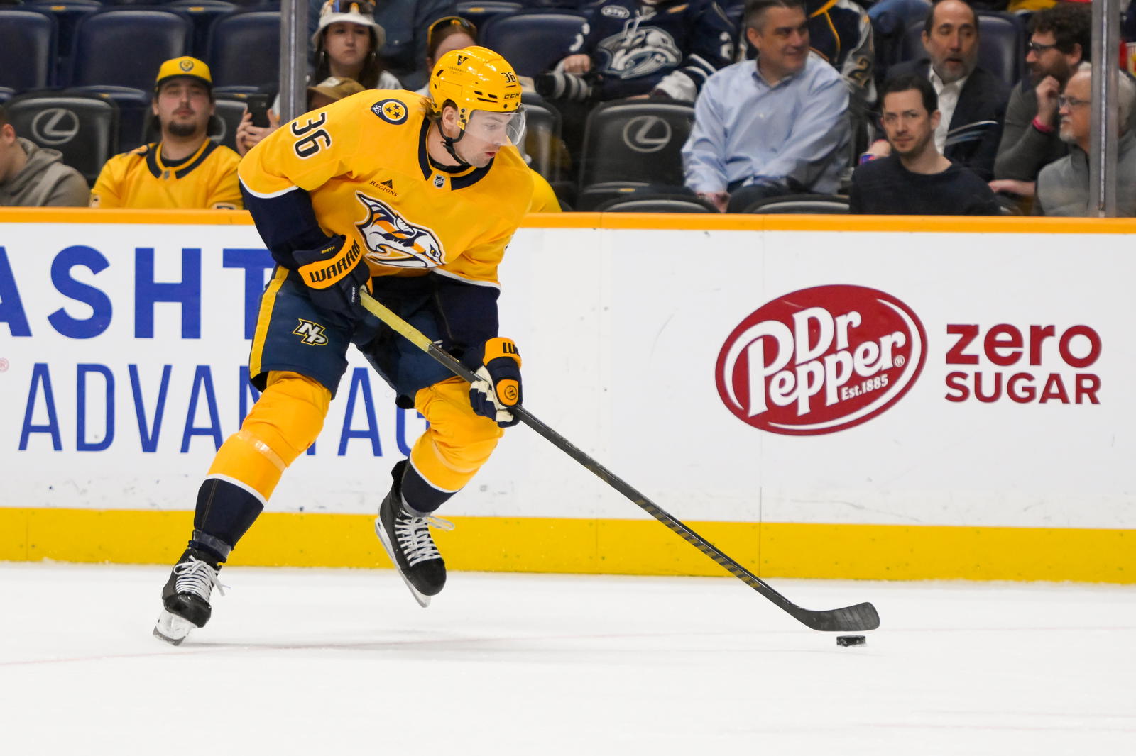 Feb 25, 2025; Nashville, Tennessee, USA; Nashville Predators left wing Cole Smith (36) skates with the puck against the Florida Panthers during the first period at Bridgestone Arena. Mandatory Credit: Steve Roberts-Imagn Image