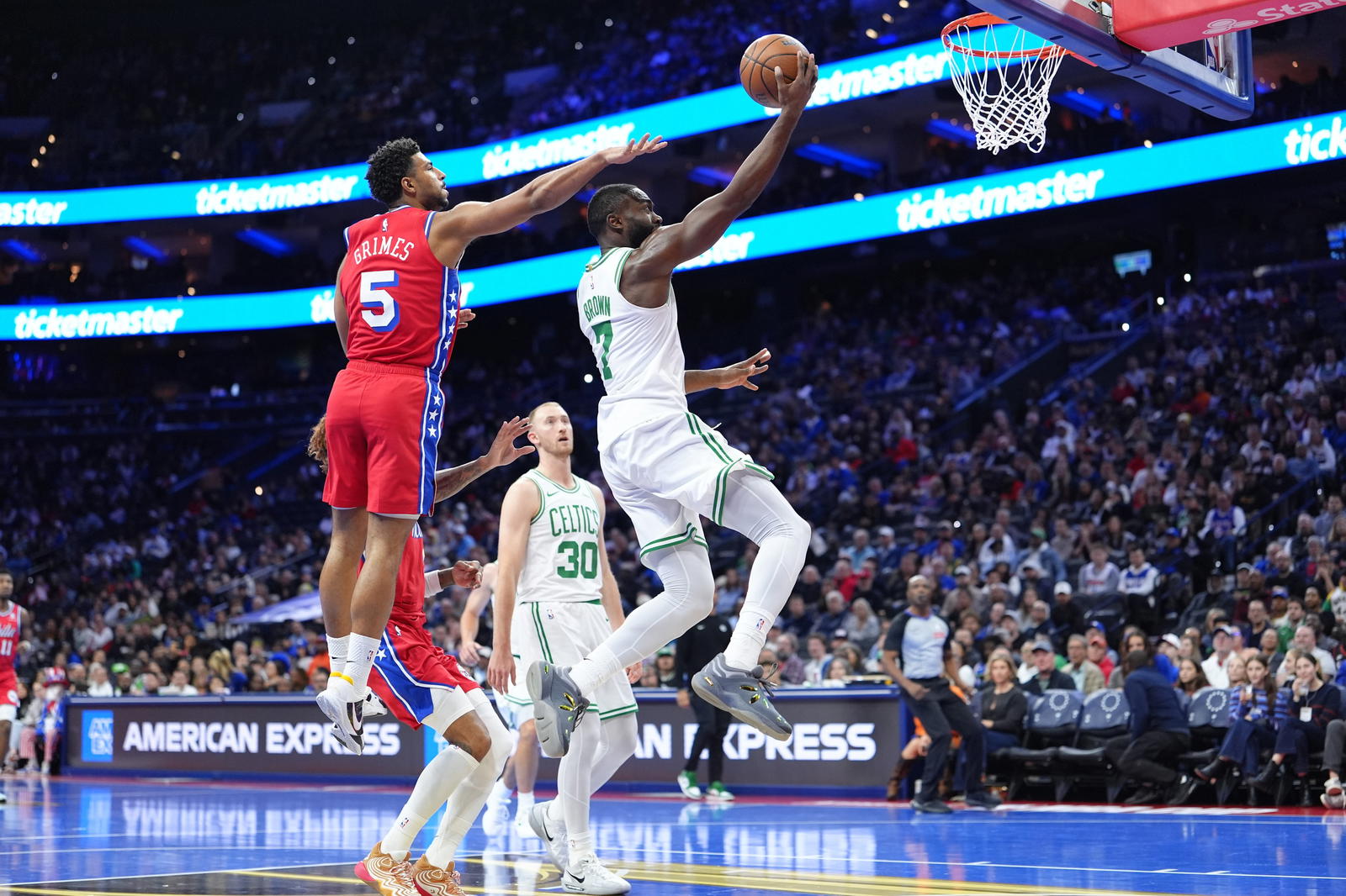 Oct 31, 2025; Philadelphia, Pennsylvania, USA; Boston Celtics forward Jaylen Brown (7) drives to shoot against Philadelphia 76ers guard Quentin Grimes (5) in the first quarter at Xfinity Mobile Arena. (Kyle Ross/Imagn Images)
