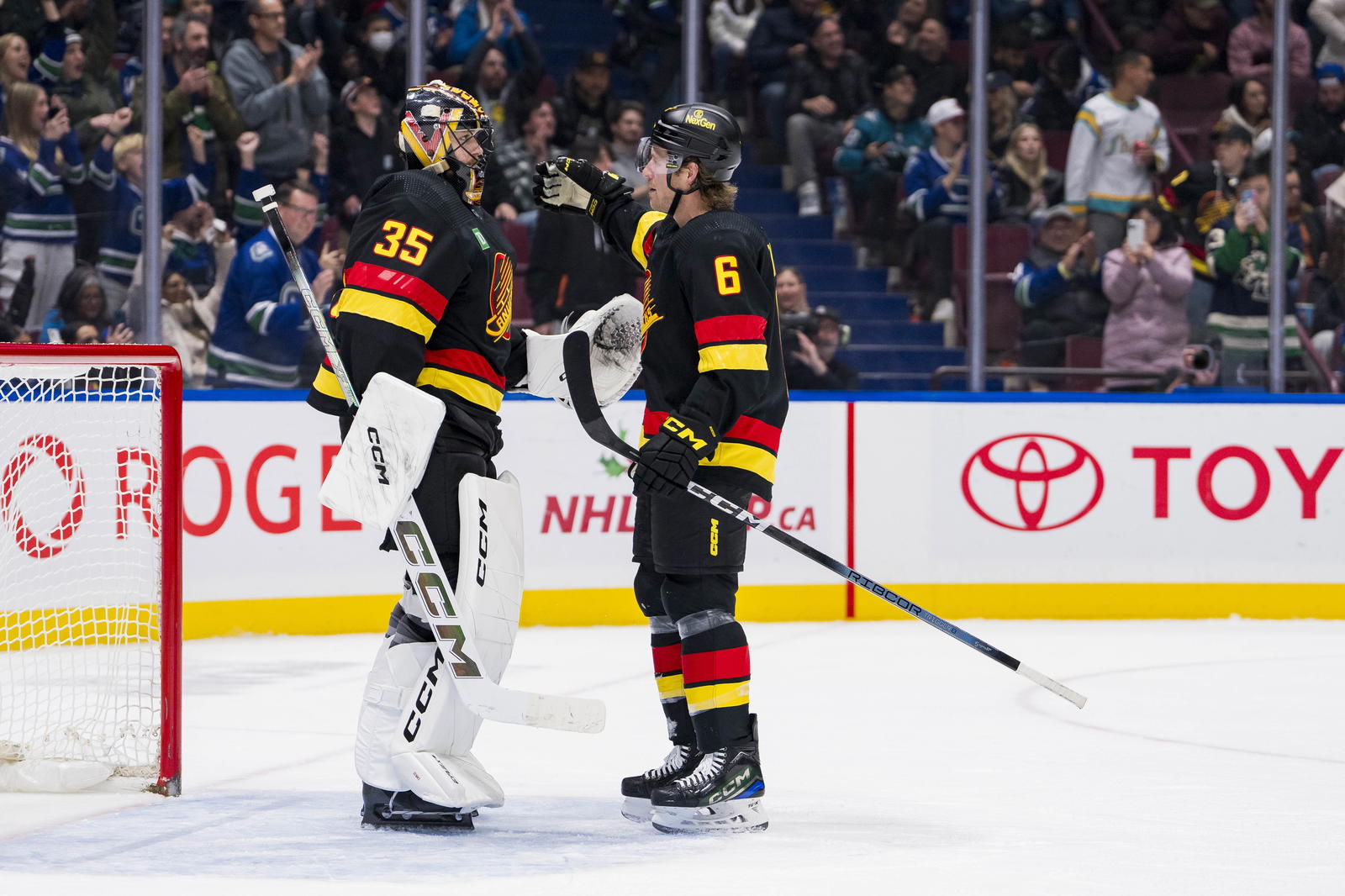 Nov 20, 2023; Vancouver, British Columbia, CAN; Vancouver Canucks goalie Thatcher Demko (35) and Vancouver Canucks forward Brock Boeser (6) celebrate their victory against the San Jose Sharks at Rogers Arena. Vancouver won 3-1. Mandatory Credit: Bob Frid-Imagn Images