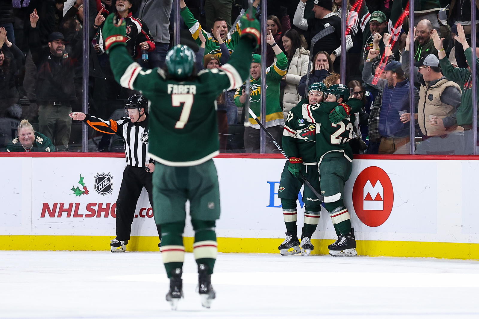 Kirill Kaprizov celebrates his game-winning overtime goal with Marco Rossi on Dec. 3, 2024. (Matt Krohn-Imagn Images)