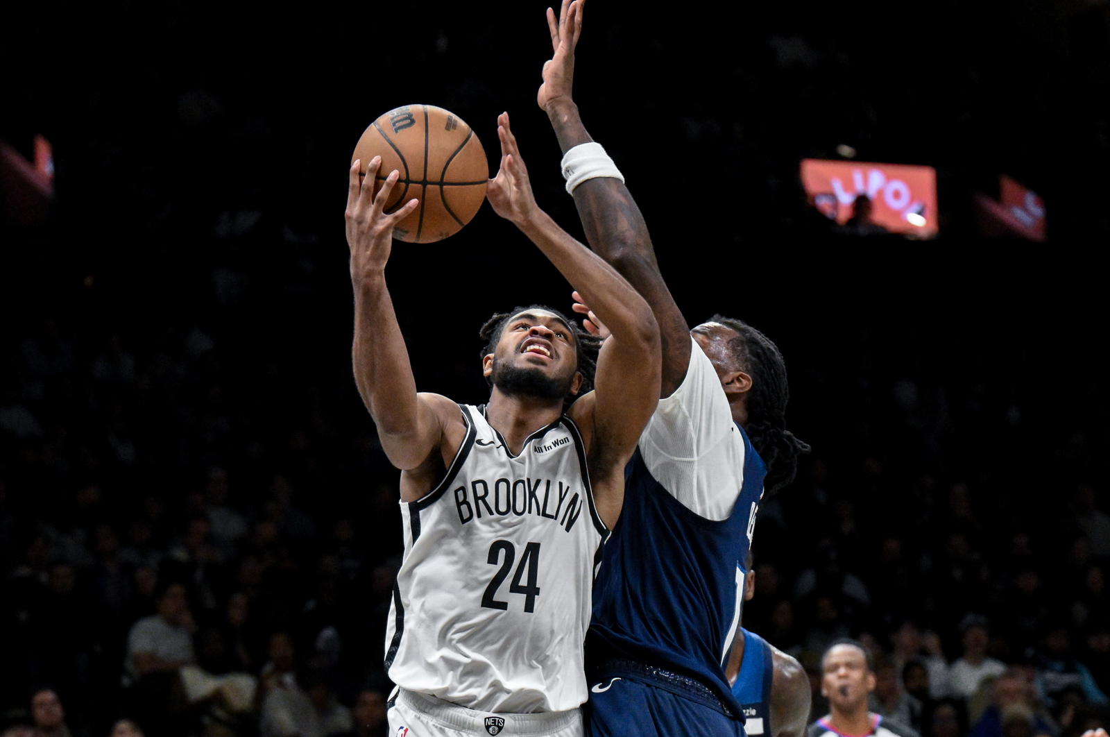 Brooklyn Nets guard Cam Thomas (24) drives against Minnesota Timberwolves center Naz Reid (11) during the second half at Barclays Center.&nbsp;John Jones-Imagn Images