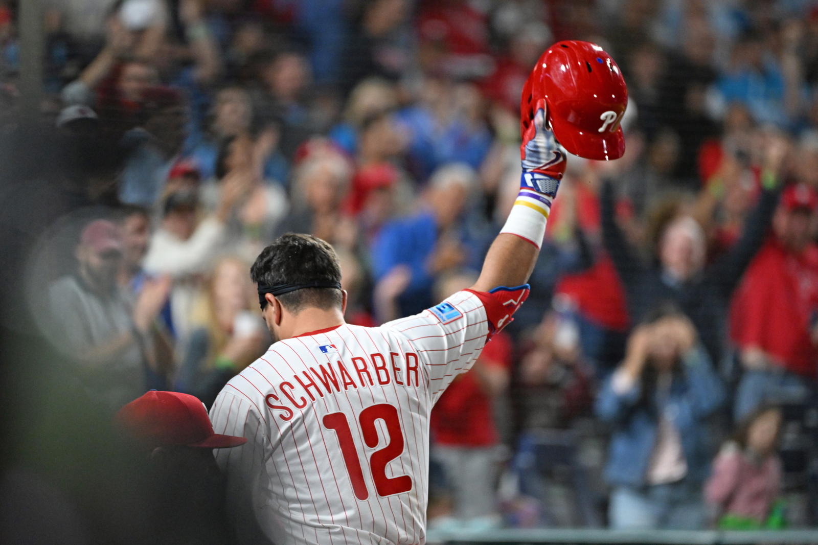 Philadelphia Phillies outfielder Kyle Schwarber (12) acknowledges the crowd after hitting his 50th home run of the season during the seventh inning against the New York Mets at Citizens Bank Park. Eric Hartline-Imagn Images