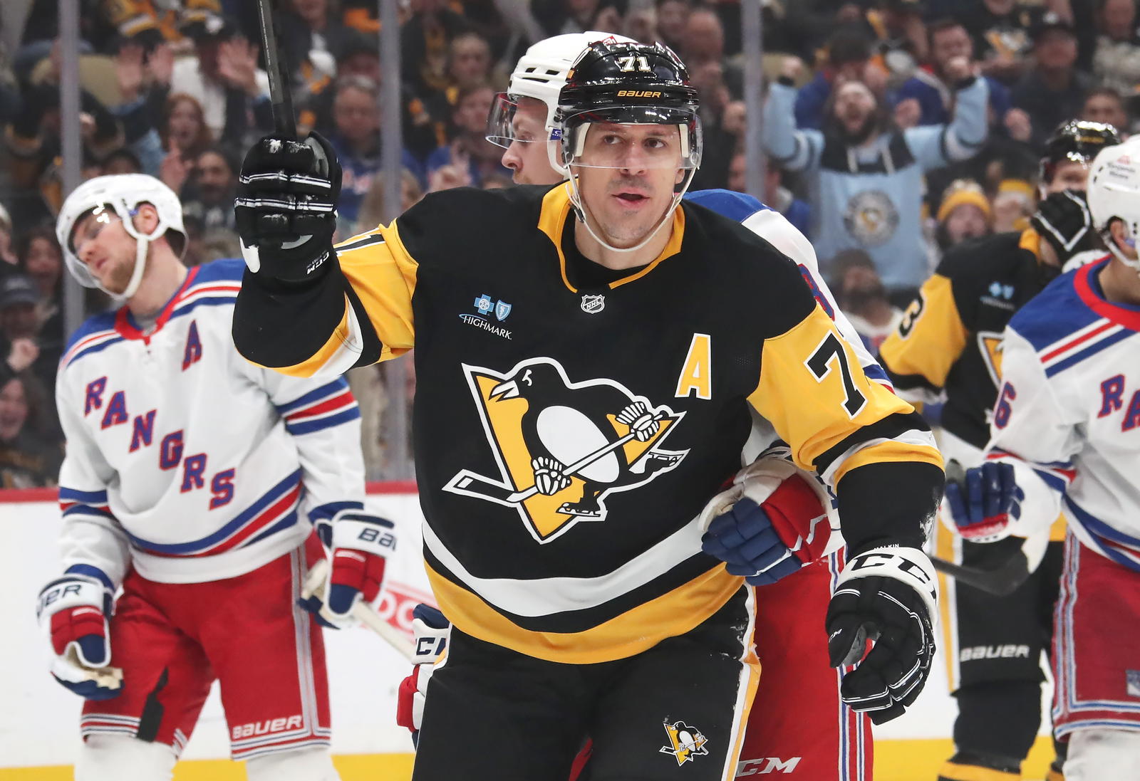 Feb 23, 2025; Pittsburgh, Pennsylvania, USA; Pittsburgh Penguins center Evgeni Malkin (71) reacts after scoring a goal against the New York Rangers during the first period at PPG Paints Arena. Mandatory Credit: Charles LeClaire-Imagn Images