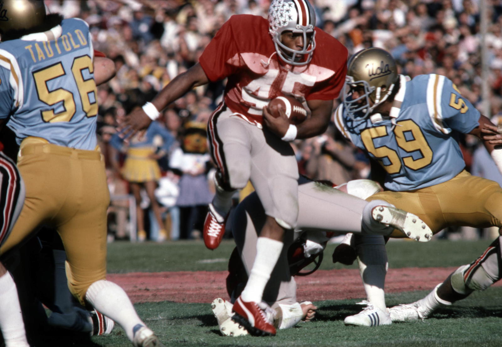 Ohio State Buckeyes running back Archie Griffin (45) carries the ball against the UCLA Bruins in the 1976 Rose Bowl. UCLA defeated Ohio State 23-10.