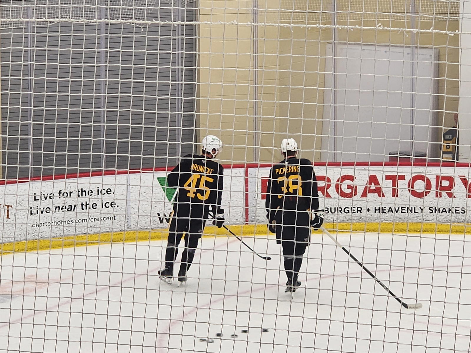 Pittsburgh Penguins' defensemen Harrison Brunicke (45) and Owen Pickering. (Kelsey Surmacz - The Hockey News)