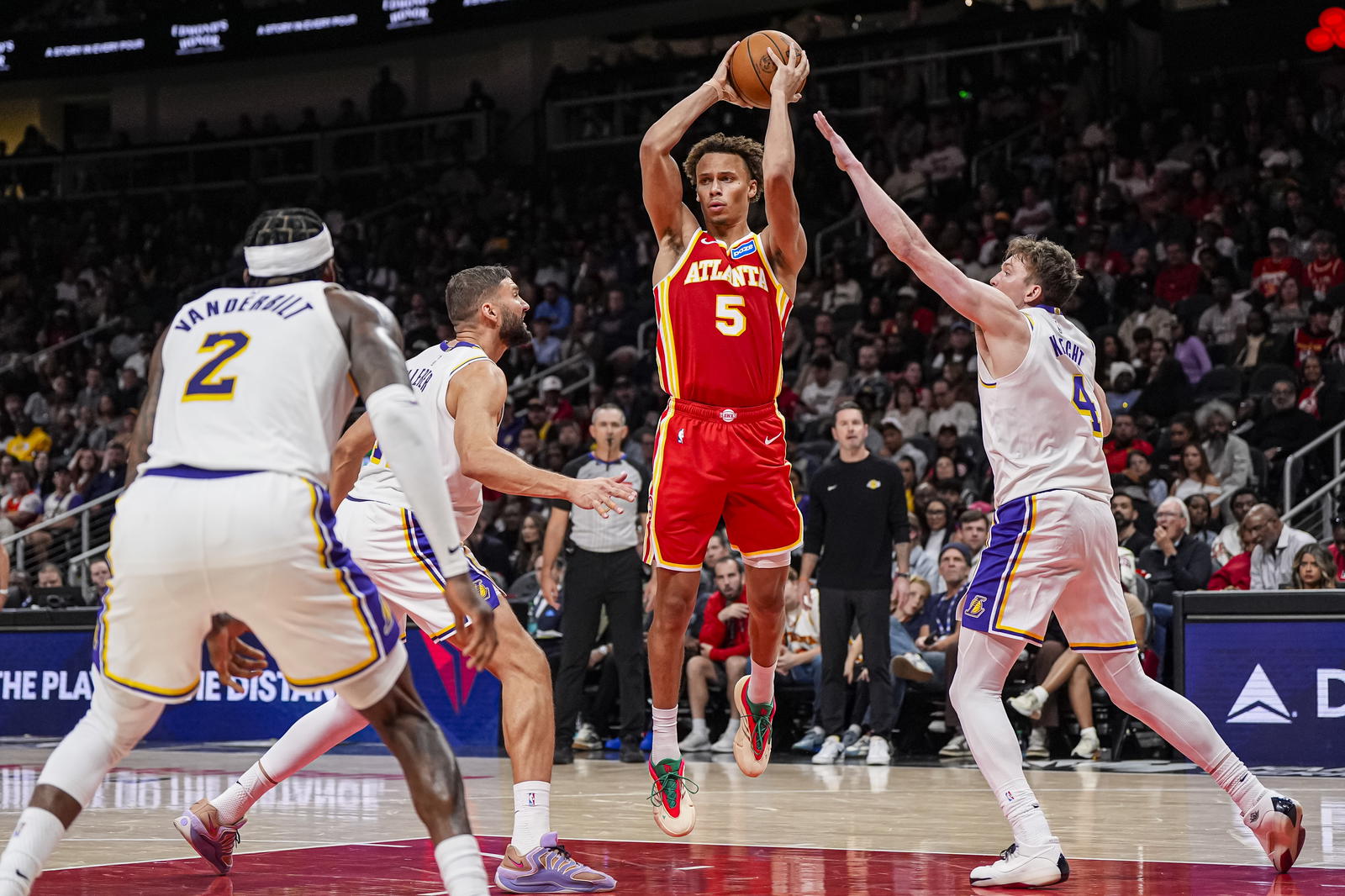 Atlanta Hawks guard Dyson Daniels (5) looks to pass against the Los Angeles Lakers during the second half at State Farm Arena. Dale Zanine-Imagn Images