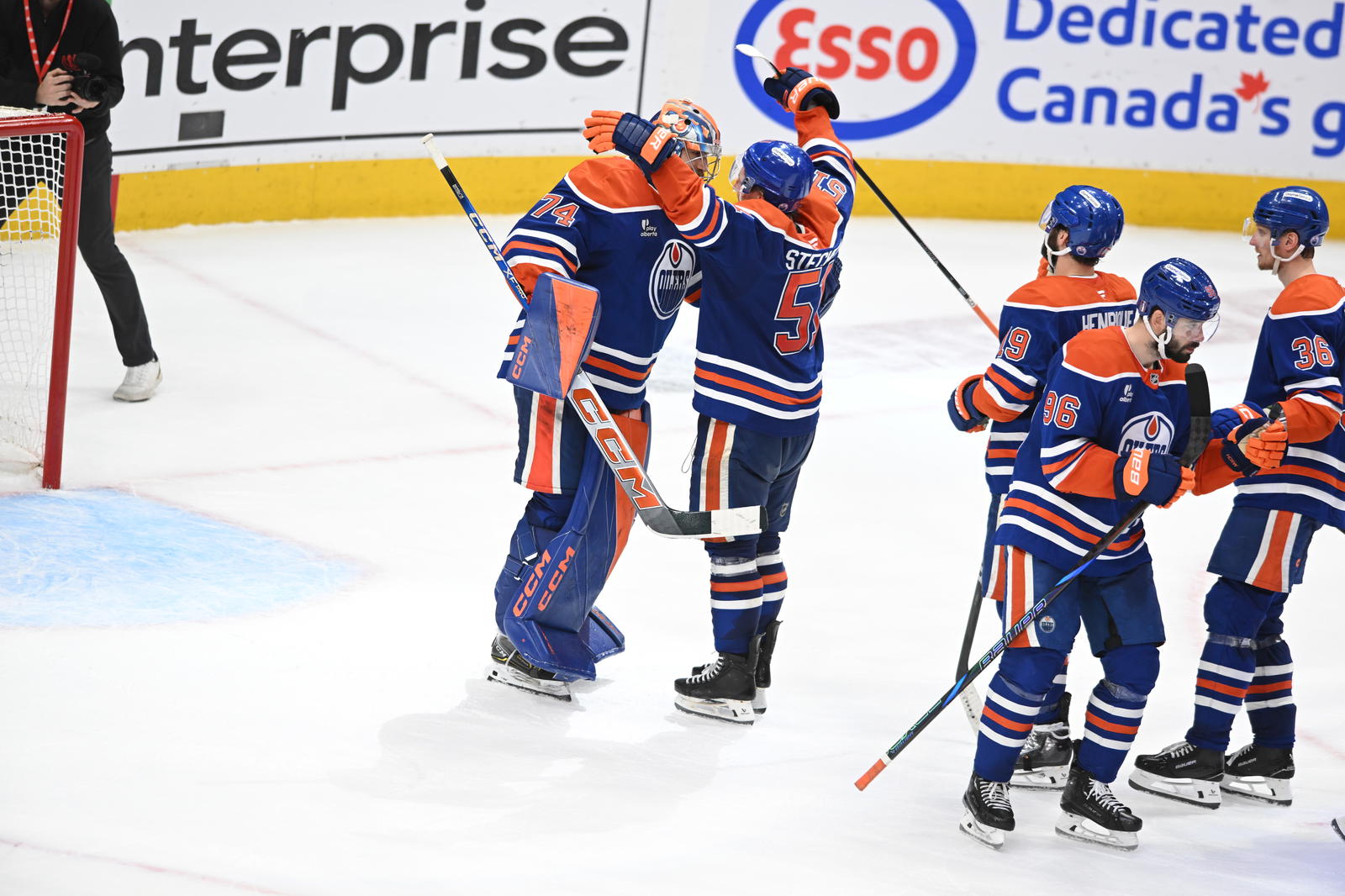 May 12, 2025; Edmonton, Alberta, CAN; Edmonton Oilers goalie Stuart Skinner (74) celebrates their win with defenseman Troy Stecher (51) over the Las Vegas Golden Knights during the third period in game three of the second round of the 2025 Stanley Cup Playoffs at Rogers Place. Mandatory Credit: Walter Tychnowicz-Imagn Images