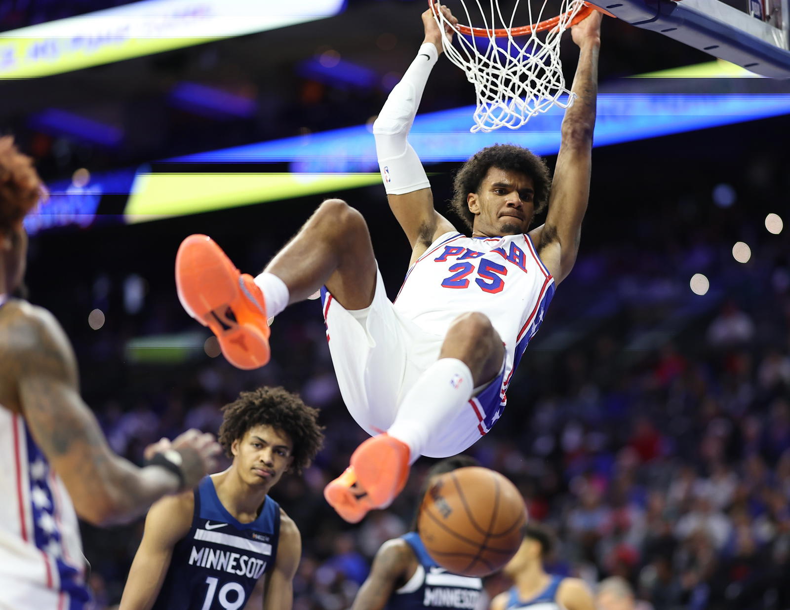 Oct 17, 2025; Philadelphia, Pennsylvania, USA; Philadelphia 76ers forward Dominick Barlow (25) dunks the ball against the Minnesota Timberwolves during the third quarter at Xfinity Mobile Arena. Mandatory Credit: Bill Streicher-Imagn Images
