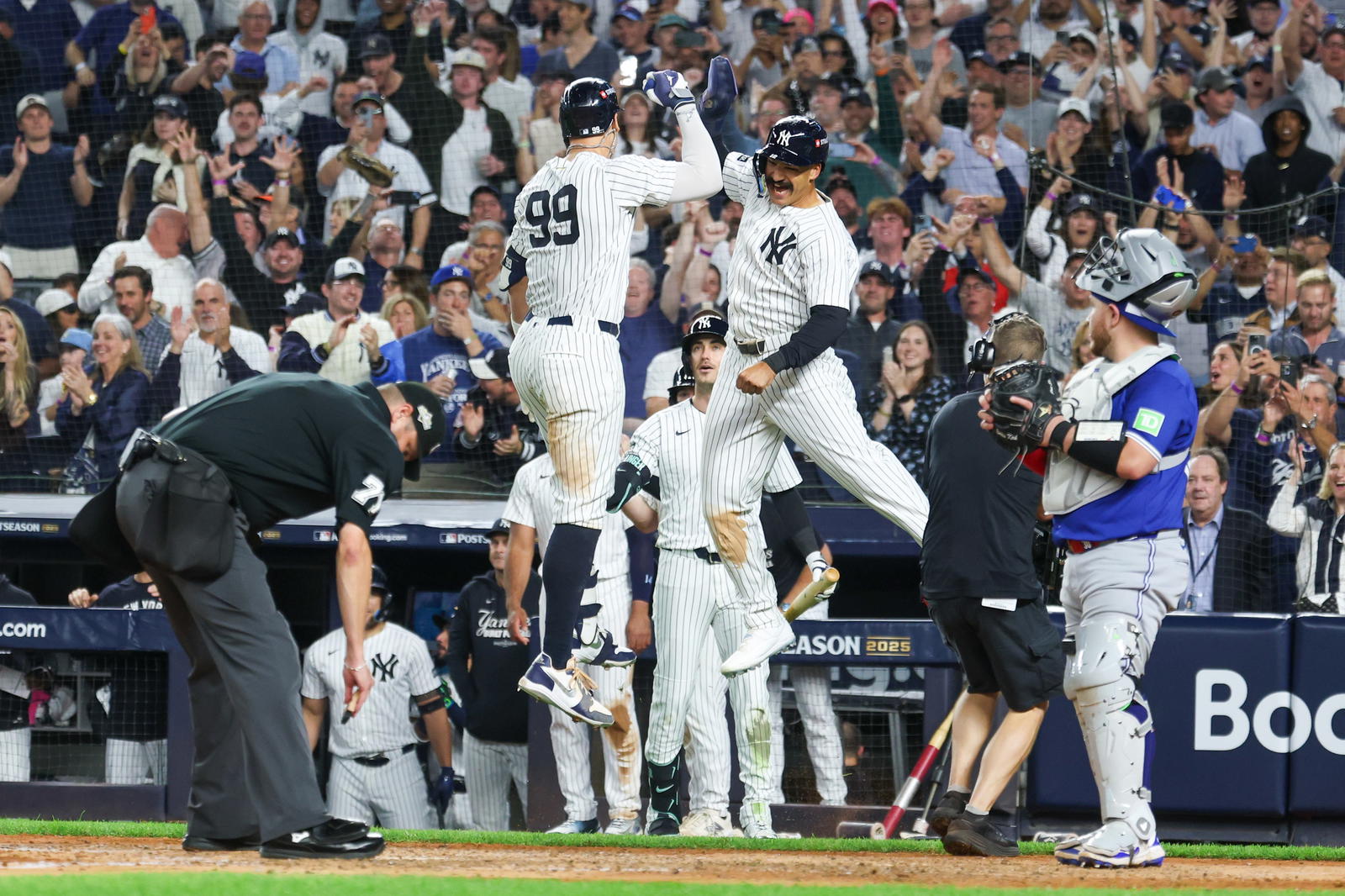 New York Yankees outfielders Aaron Judge and Trent Grisham celebrate. Credit: Vincent Carchietta-Imagn Images.
