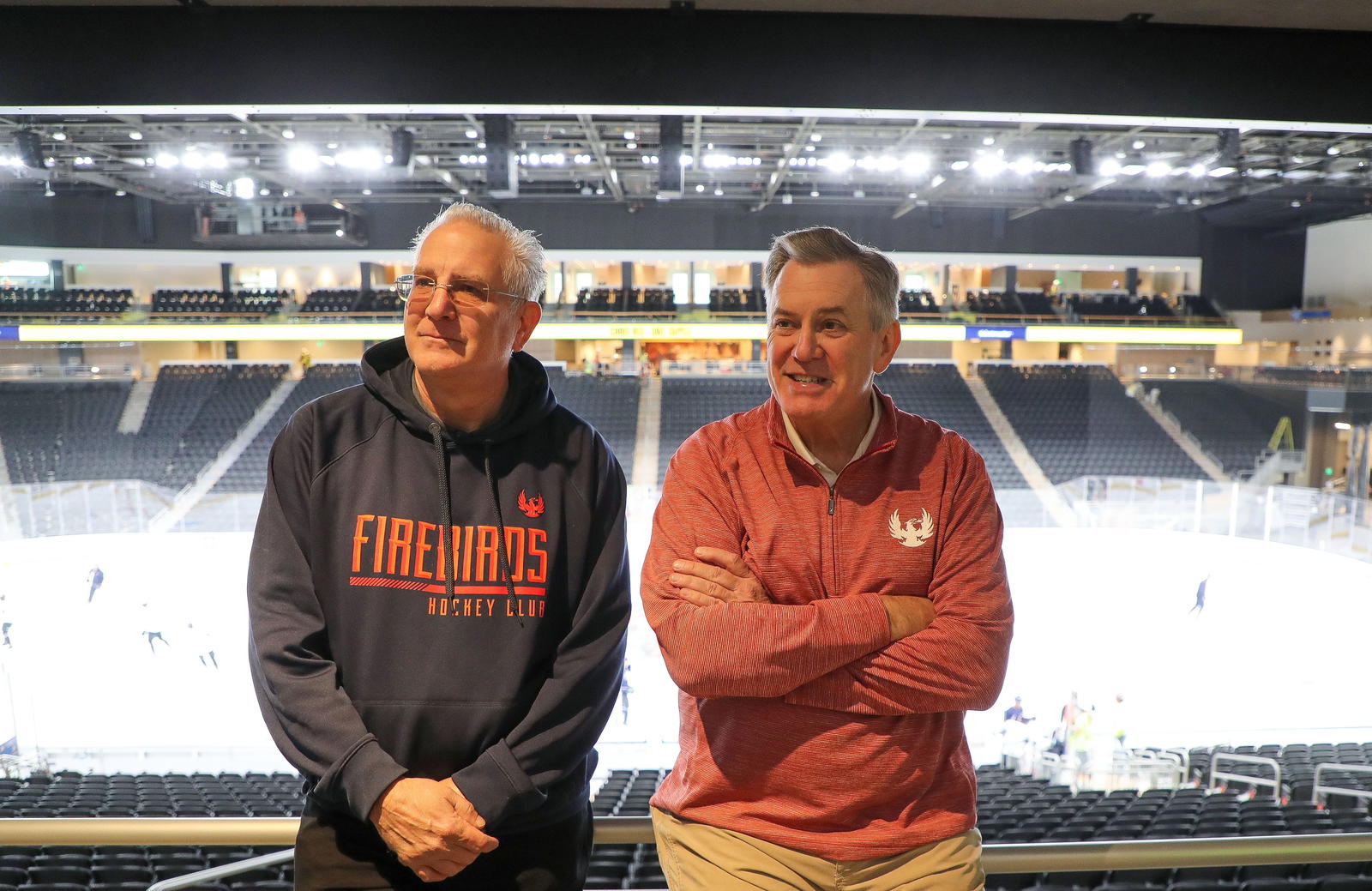 Tim Leiweke, left, and Tod Leiweke speaks to the press during the Coachella Valley Firebirds first practice on the main rink at Acrisure Arena in Thousand Palms, Calif., Dec. 12, 2022. Firebirds Practice 12
