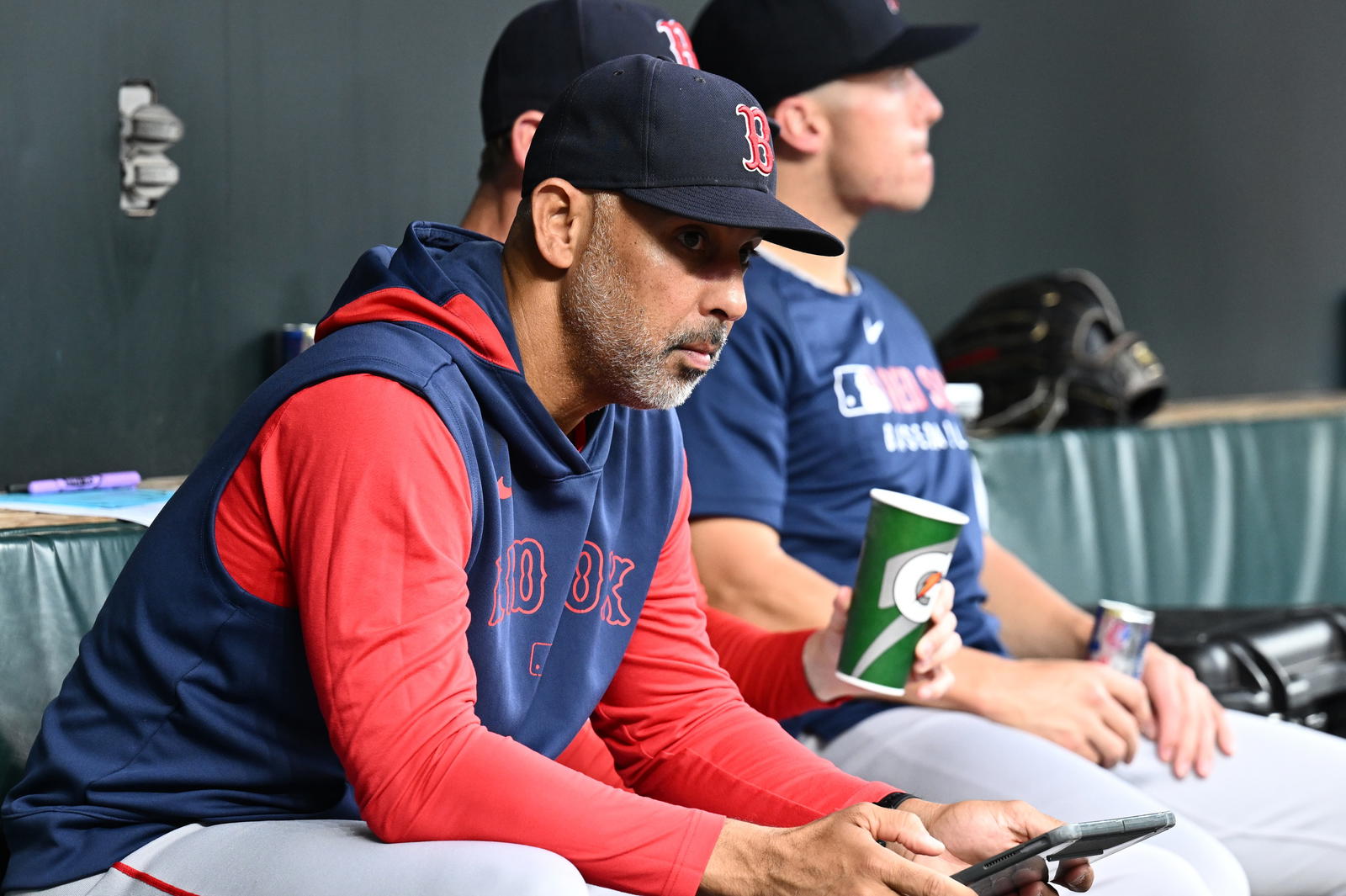 Aug 26, 2025; Baltimore, Maryland, USA; Boston Red Sox manager Alex Cora (13) sits in the dugout before the game between the Baltimore Orioles and the Boston Red Sox at Oriole Park at Camden Yards. (James A. Pittman/Imagn Images)