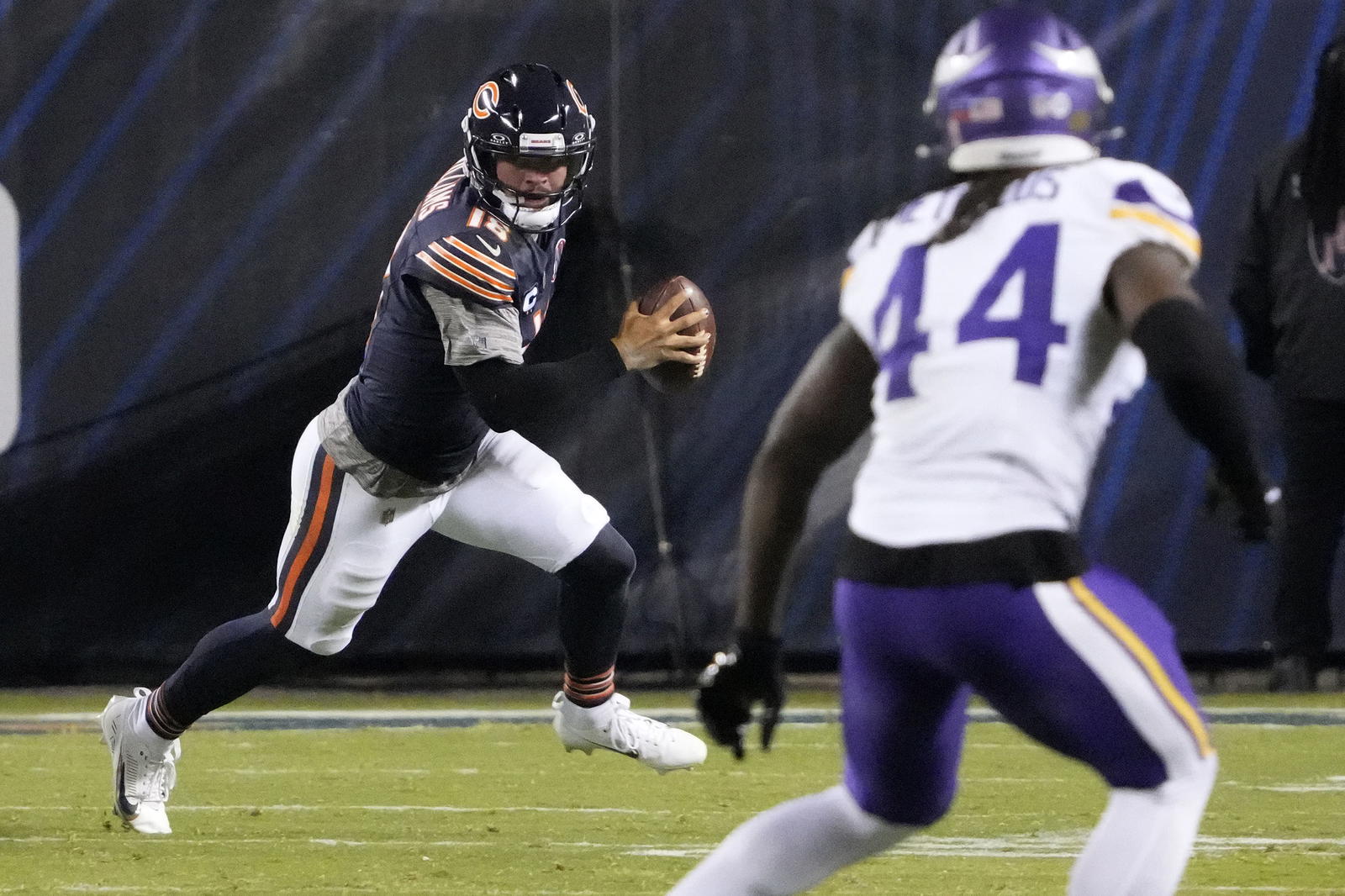 Chicago Bears quarterback Caleb Williams (18) rushes the ball against the Minnesota Vikings during the first half at Soldier Field. <br>David Banks-Imagn Images