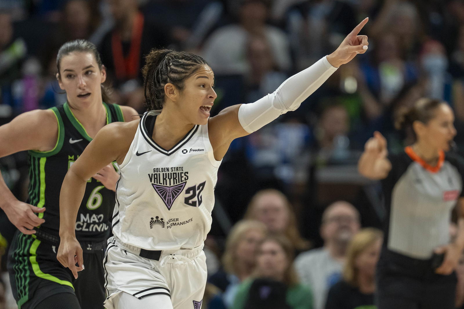 Sep 14, 2025; Minneapolis, Minnesota, USA; Golden State Valkyries guard Veronica Burton (22) celebrates after making a three point shot against the Minnesota Lynx in the first half during game one of round one for the 2025 WNBA Playoffs at Target Center. Mandatory Credit: Jesse Johnson-Imagn Images