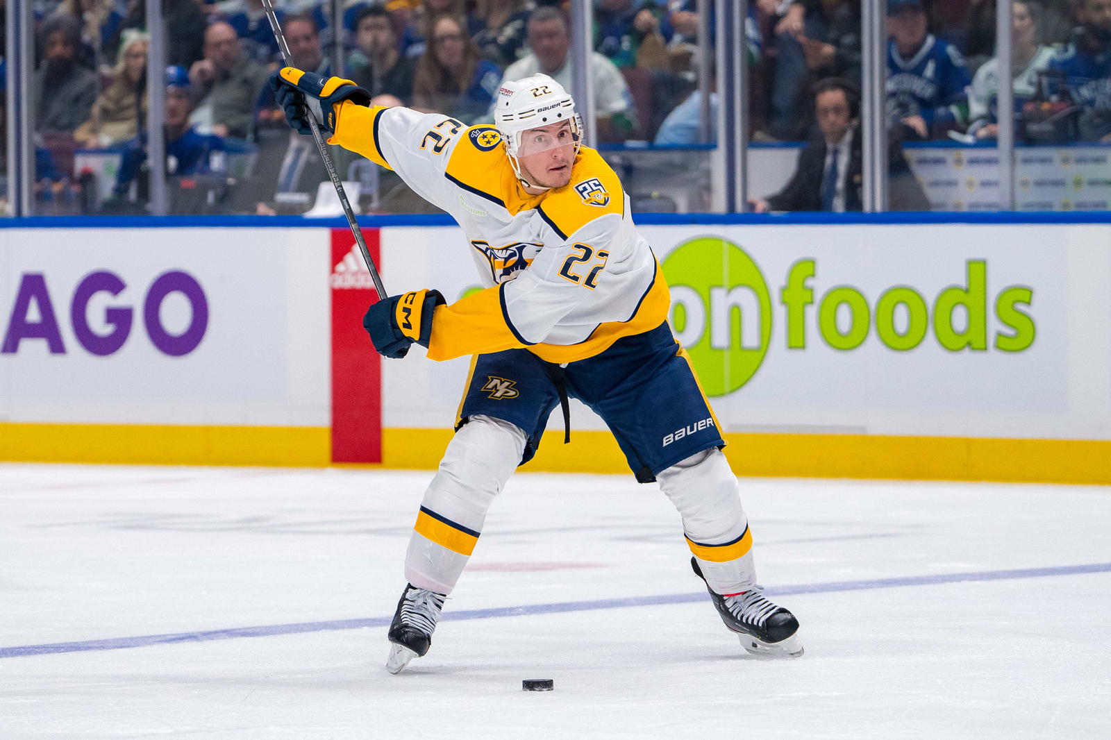 Apr 30, 2024; Vancouver, British Columbia, CAN; Nashville Predators defenseman Tyson Barrie (22) handles the puck against the Vancouver Canucks during the second period in game five of the first round of the 2024 Stanley Cup Playoffs at Rogers Arena. Mandatory Credit: Bob Frid-Imagn Images
