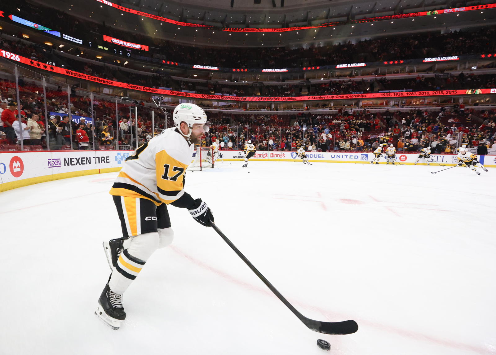 Apr 6, 2025; Chicago, Illinois, USA; Pittsburgh Penguins right wing Bryan Rust (17) warms up before a game against the Chicago Blackhawks at United Center. Mandatory Credit: Talia Sprague-Imagn Images