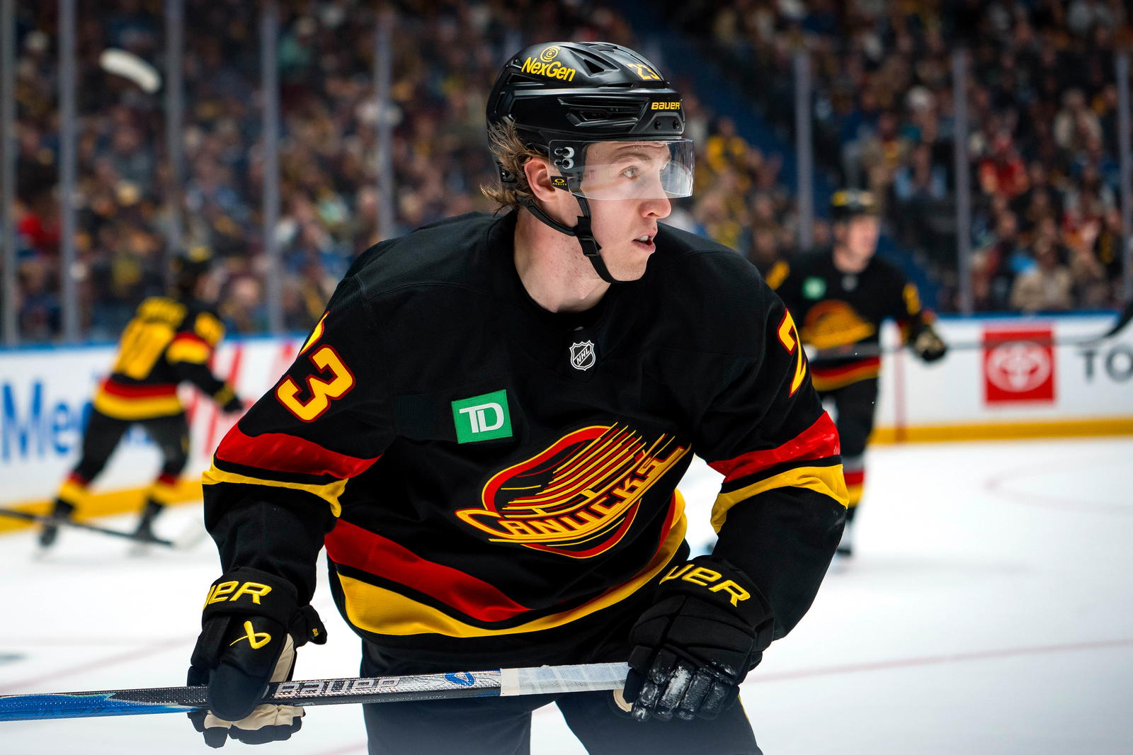 Oct 9, 2025; Vancouver, British Columbia, CAN; Vancouver Canucks forward Jonathan Lekkerimaki (23) skates against the Calgary Flames in the third period at Rogers Arena. Mandatory Credit: Bob Frid-Imagn Images