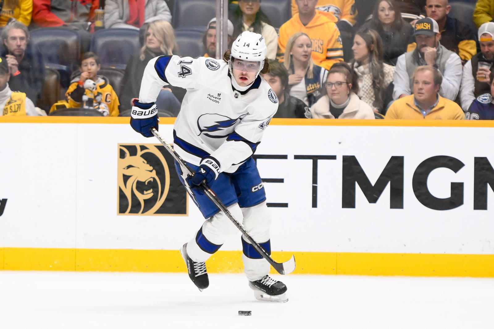Tampa Bay Lightning center Conor Geekie (14) skates with the puck against the Nashville Predators during the third period at Bridgestone Arena. Mandatory Credit: Steve Roberts-Imagn Images
