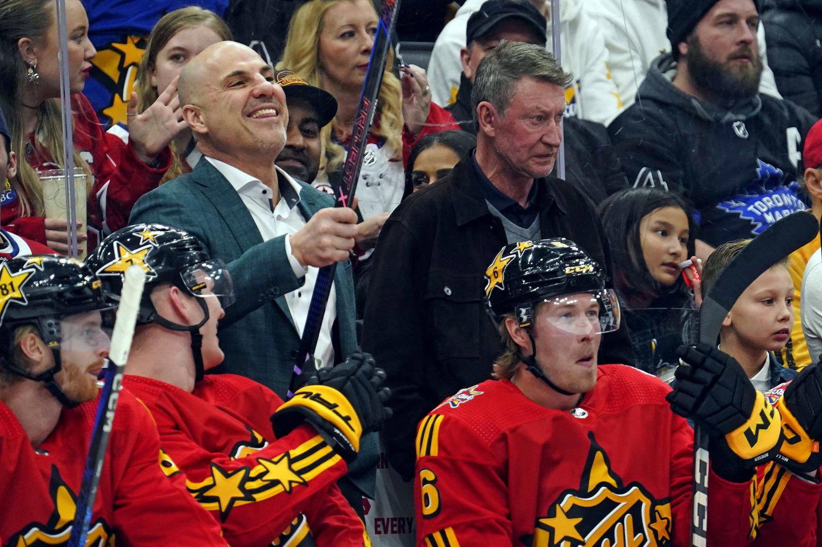 Team Hughes coach Rick Tocchet of the Vancouver Canucks and Wayne Gretzky look on in the 2024 NHL All-Star Game at Scotiabank Arena. (John E. Sokolowski-Imagn Images)