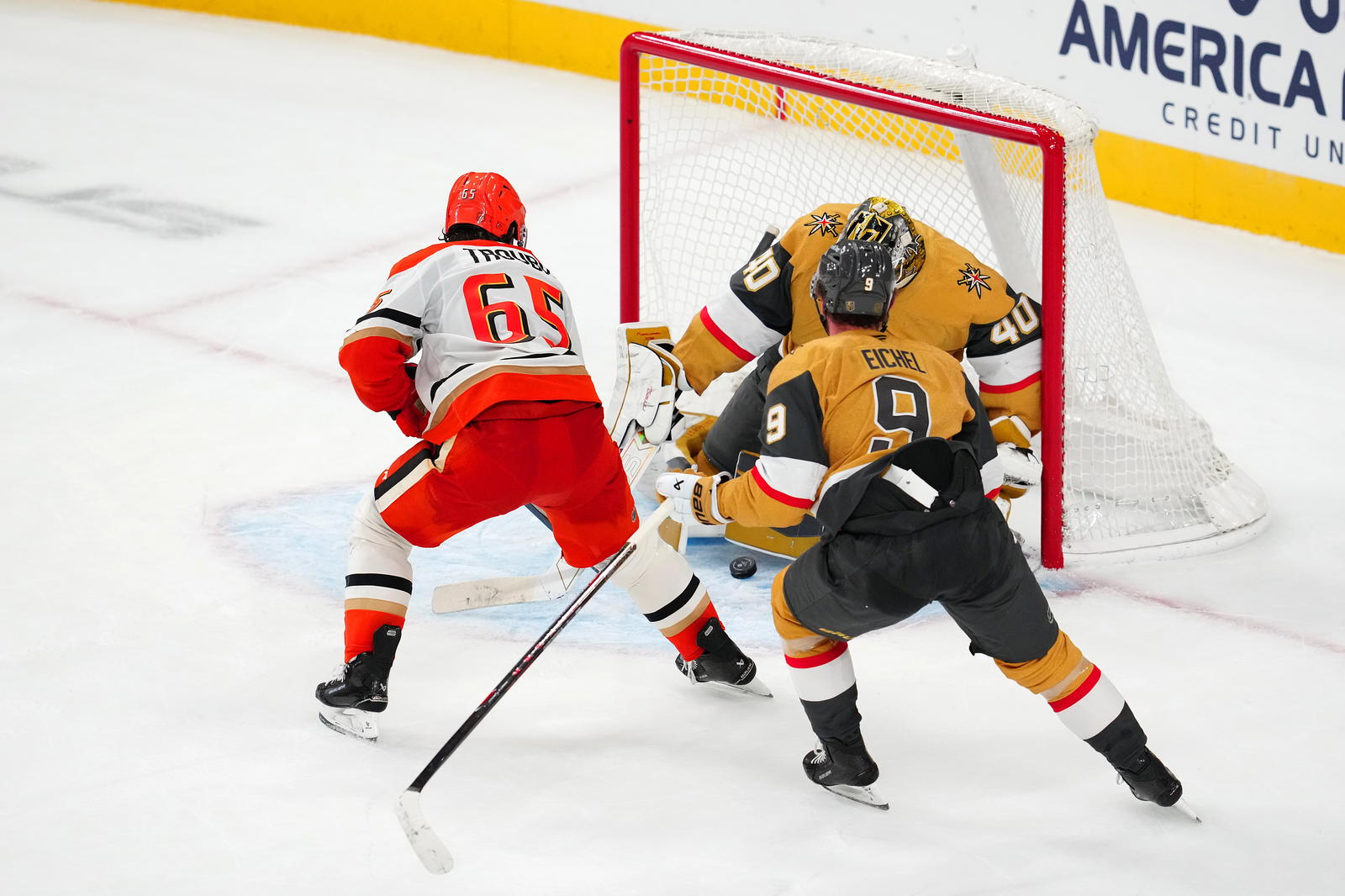 Nov 8, 2025; Las Vegas, Nevada, USA; Anaheim Ducks defenseman Jacob Trouba (65) scores a goal against Vegas Golden Knights goaltender Akira Schmid (40) during an overtime period to give the Ducks a 4-3 victory at T-Mobile Arena. Mandatory Credit: Stephen R. Sylvanie-Imagn Images
