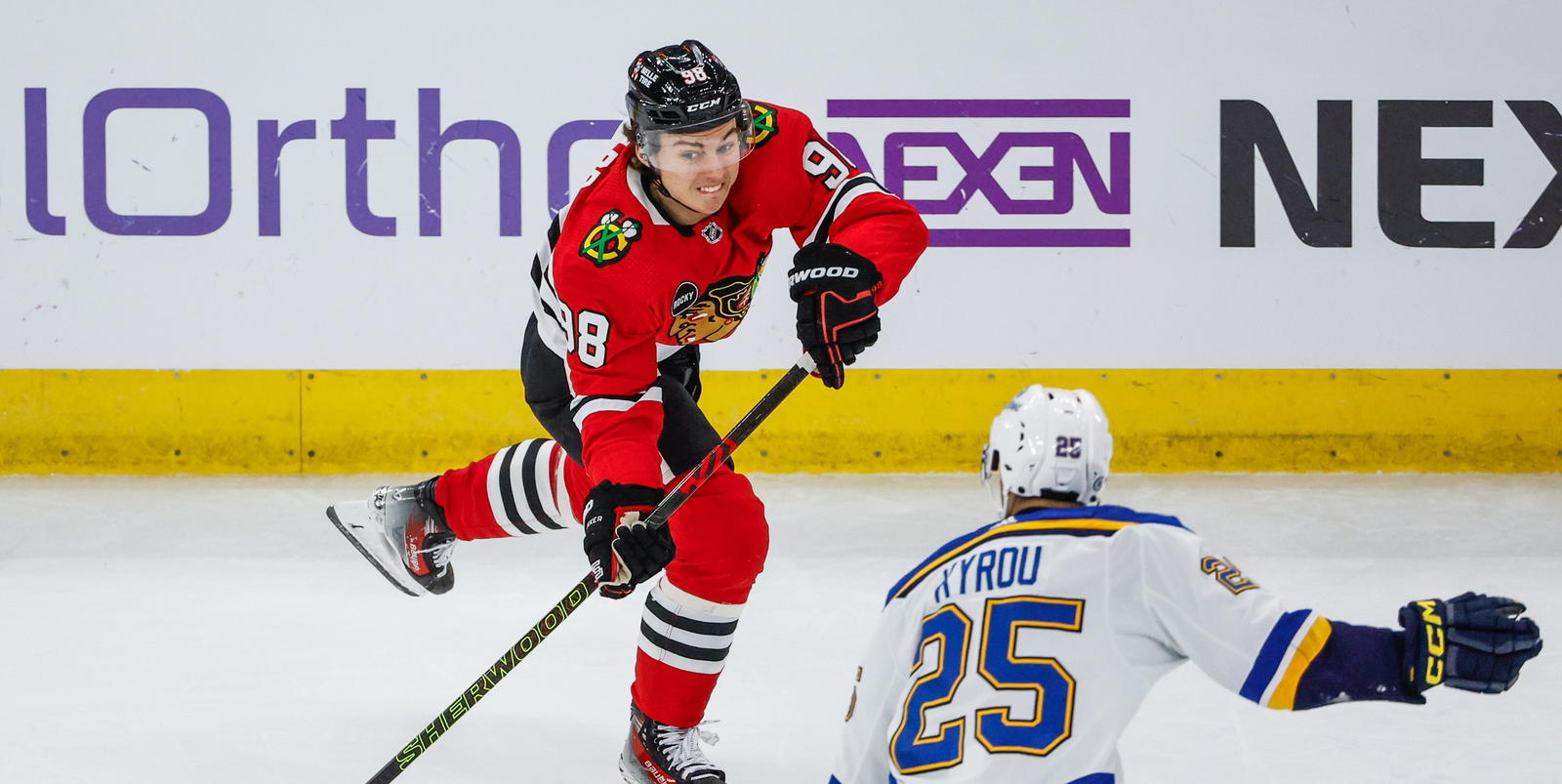 Bedard, Kyrou Back Offense in High-Scoring Hawks-Blues Matchup