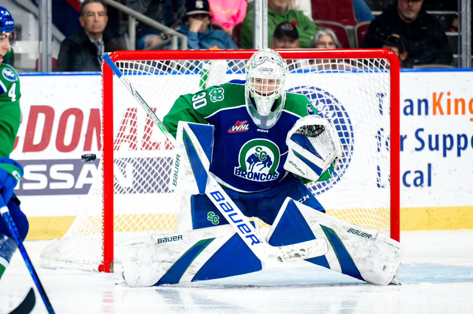 #30 Reid Dyck tracks the puck in a game for the Swift Current Broncos. via pembinavalleyonline.com
