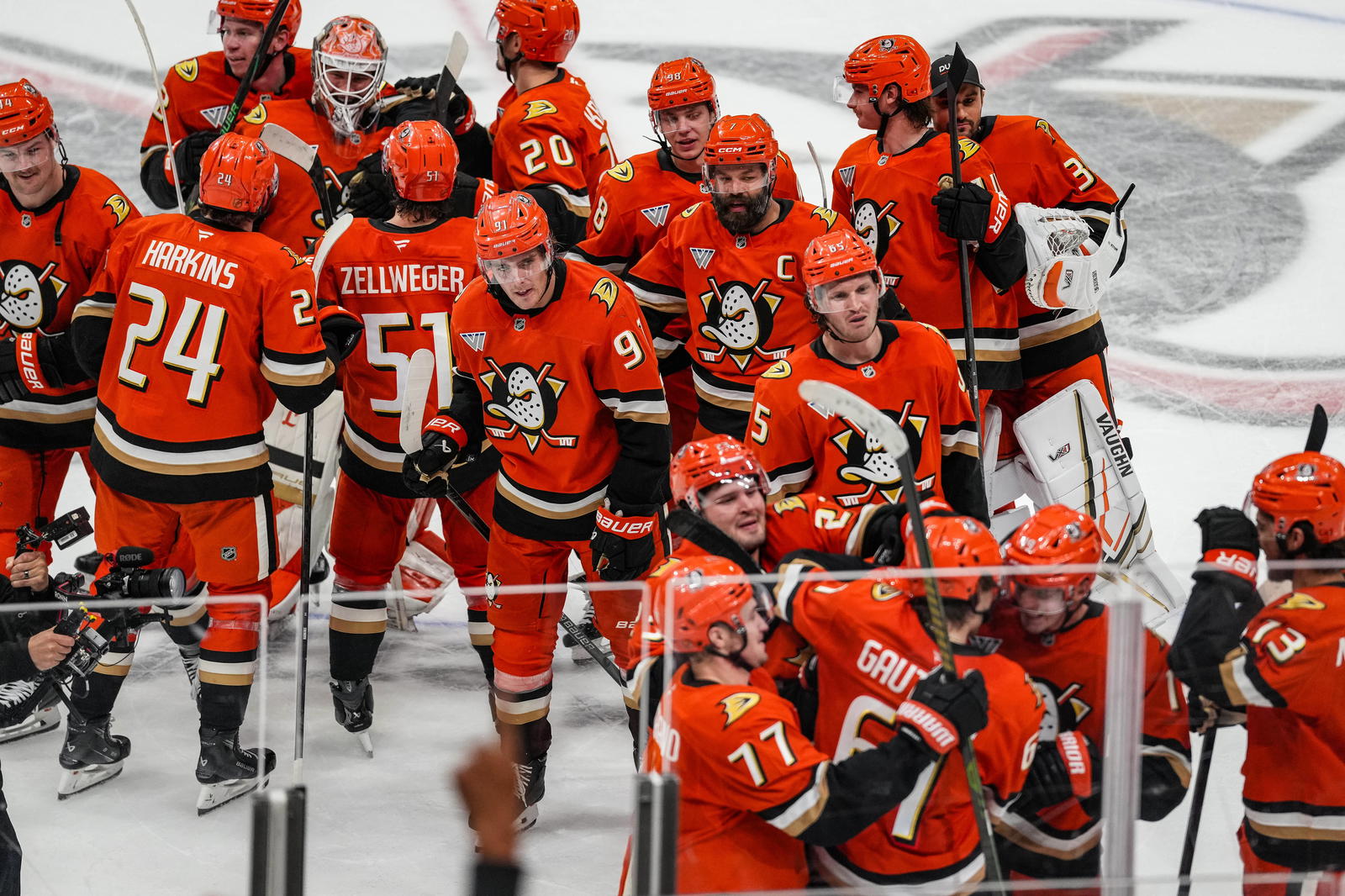 Nov 22, 2025; Anaheim, California, USA; Anaheim Ducks celebrate their overtime win against Vegas Golden Knights at Honda Center. Mandatory Credit: Corinne Votaw-Imagn Images
