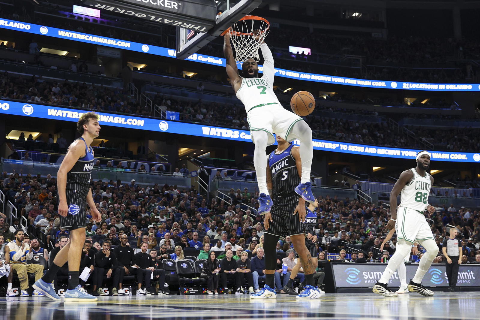 Nov 7, 2025; Orlando, Florida, USA; Boston Celtics guard Jaylen Brown (7) dunks the ball against the Orlando Magic in the second quarter at Kia Center. (Nathan Ray Seebeck/Imagn Images)