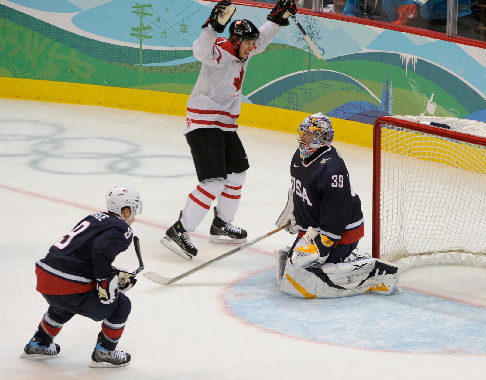 Canada's Sidney Crosby scores in overtime against USA goalie Ryan Miller to win the gold medal at the 2010 Vancouver Olympics. © H. Darr Beiser / USA TODAY NETWORK via Imagn Images