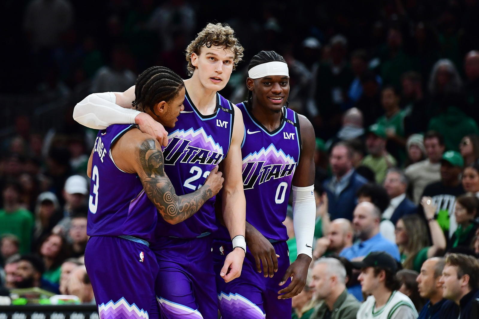 Nov 3, 2025; Boston, Massachusetts, USA; Utah Jazz guard Keyonte George (3), forward Lauri Markkanen (23), and forward Taylor Hendricks (0) react during the second half against the Boston Celtics at TD Garden. (Bob DeChiara/Imagn Images)