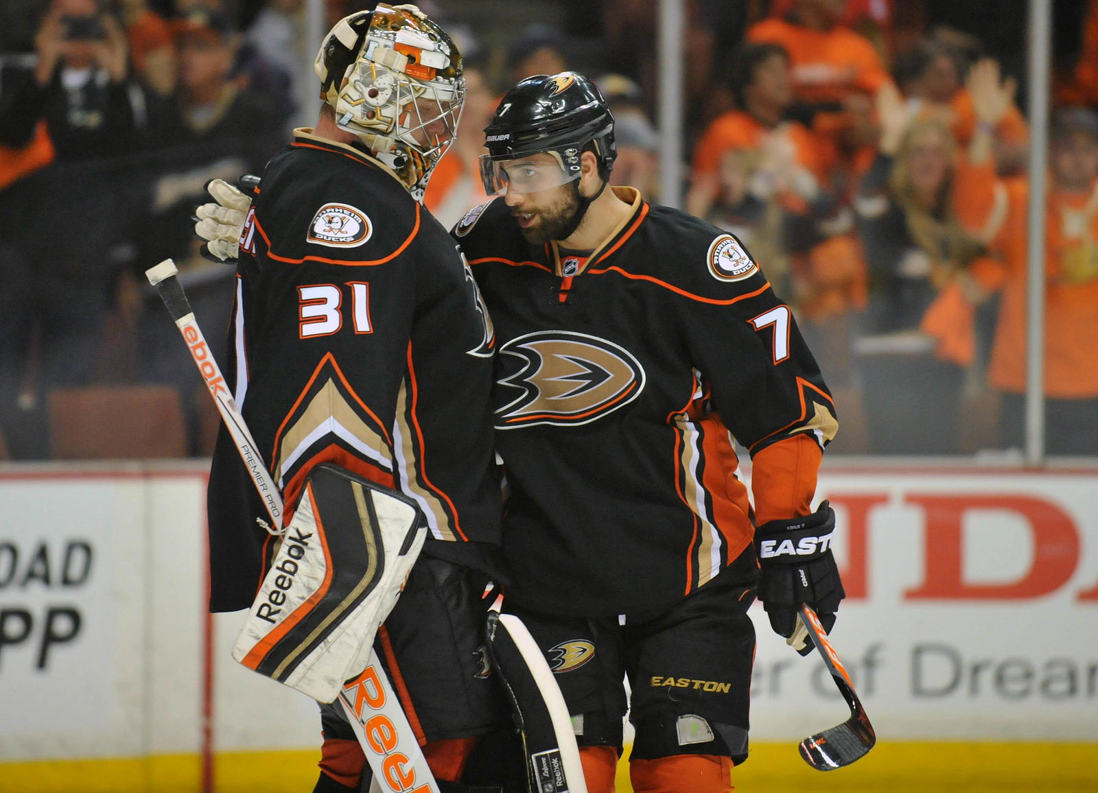 May 17, 2015; Anaheim, CA, USA; Anaheim Ducks goalie Frederik Andersen (31) and center Andrew Cogliano (7) celebrate the 4-1 victory against the Chicago Blackhawks following the third period in game one of the Western Conference Final of the 2015 Stanley Cup Playoffs at Honda Center. (Gary A. Vasquez-Imagn Images)