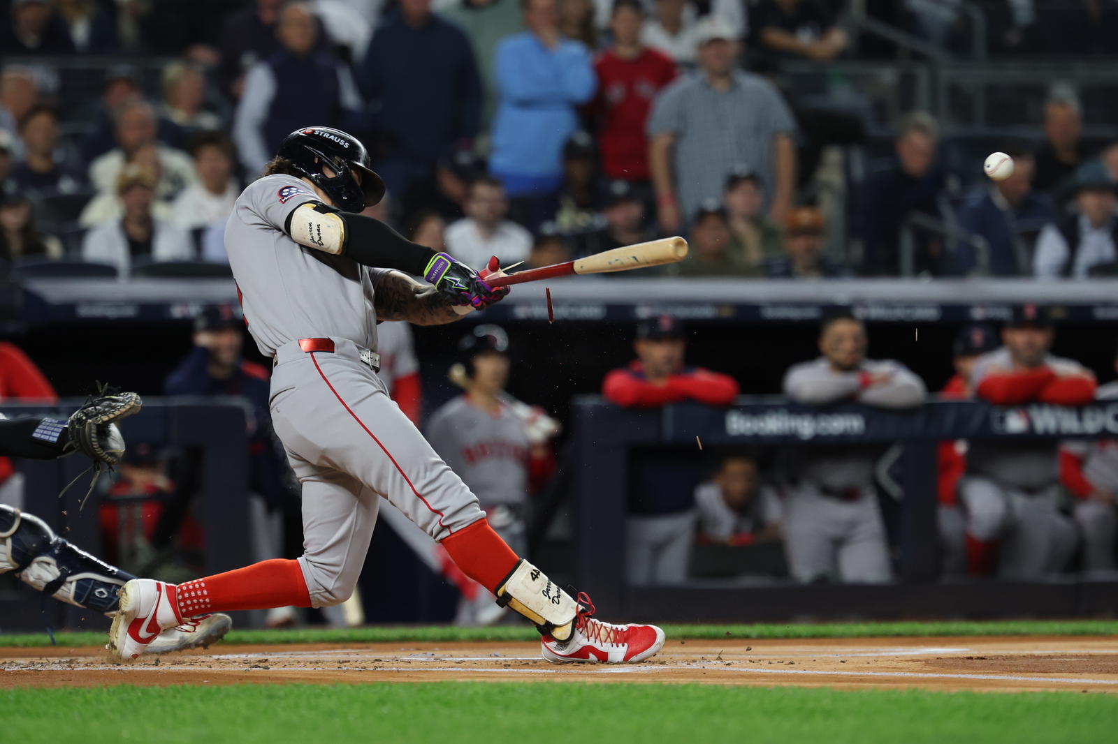 Boston Red Sox outfielder Jarren Duran (16) breaks his bat as he lines out during the first inning against the New York Yankees during game three of the Wildcard round for the 2025 MLB playoffs at Yankee Stadium. Vincent Carchietta-Imagn Images